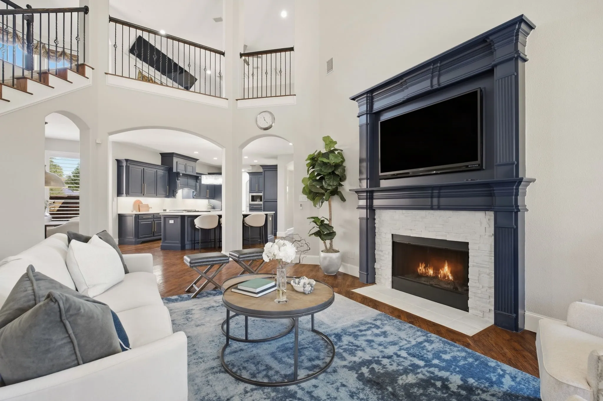  The open flow from kitchen, casual dining, living room & upper gameroom creates an expansive, airy feel, connecting the first and second floors seamlessly & allows family to interact across both levels. Notable: built-in wall speakers + All flat screen mounted TVs in the home will remain!