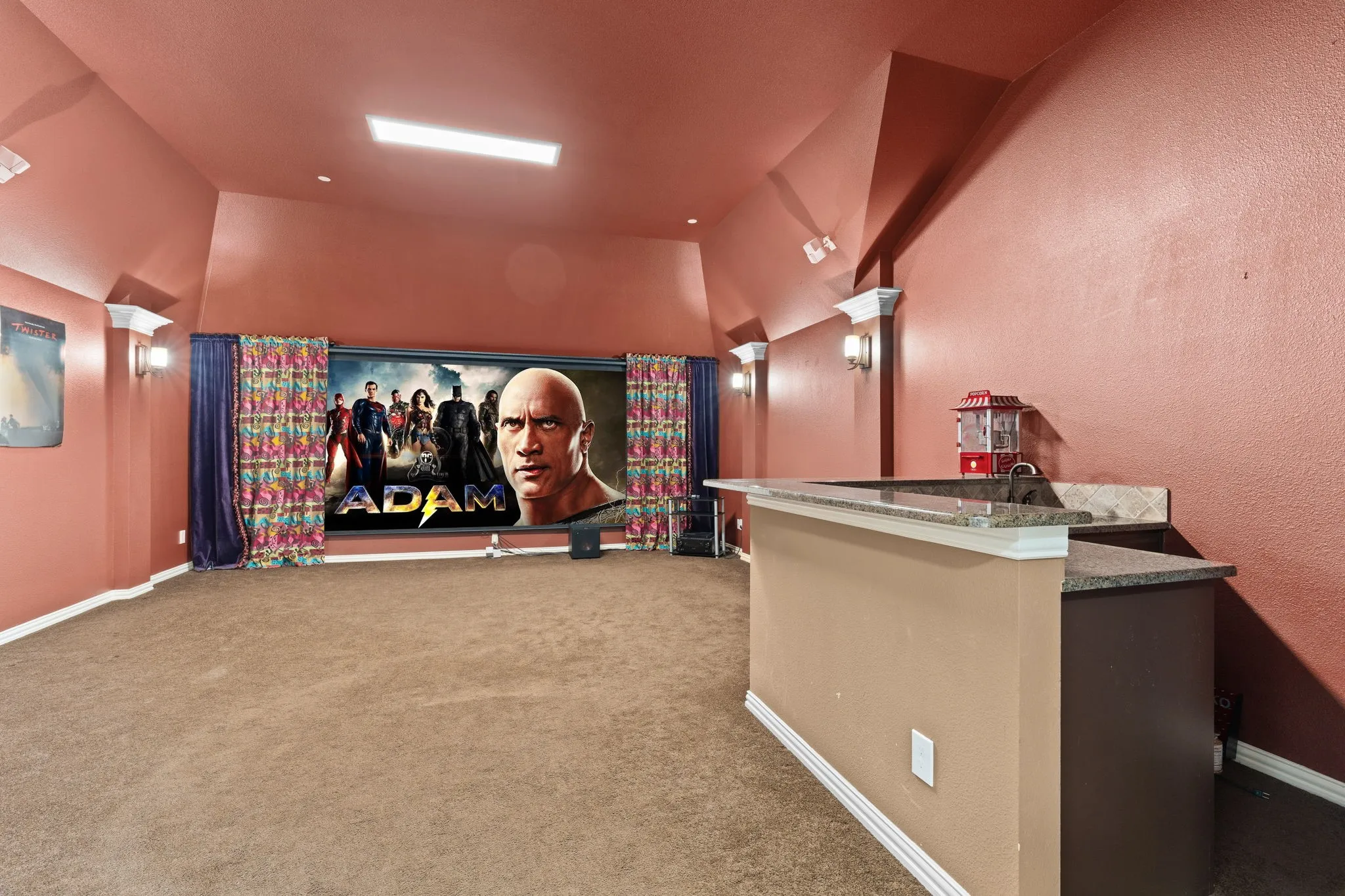 This dedicated media room is designed for a variety of activities including gaming, socializing & family time. Surround sound wired for a true home theater experience. Sellers will be leaving the mounted projector, screen, speakers & operating equipment. Wet bar in the media room includes a sink & beverage refrigerator.