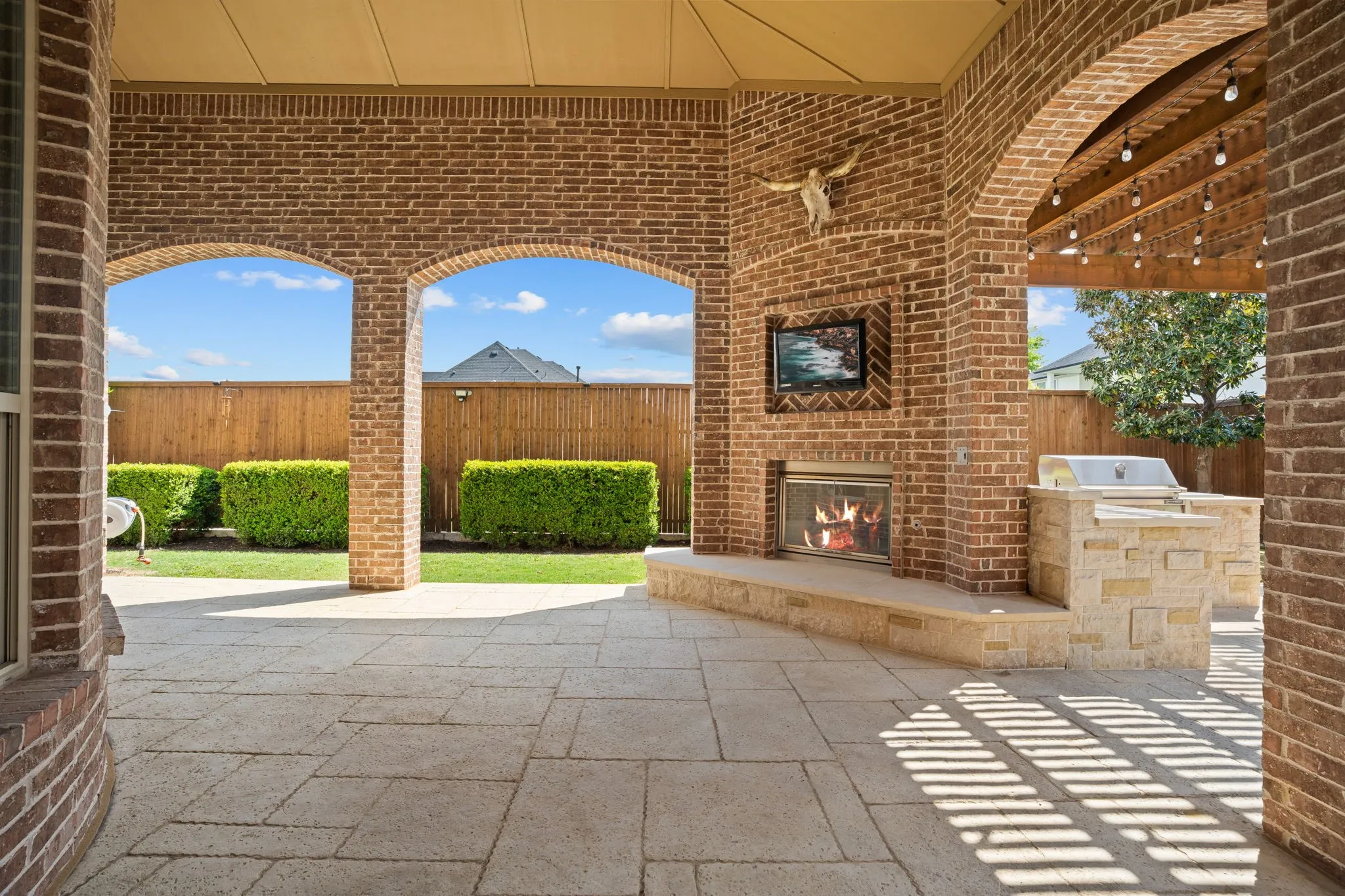 For chilly days & nights, cozy up to the gas log outdoor fireplace while watching your favorite movie or sports program. Mounted TV & outside speakers remain.