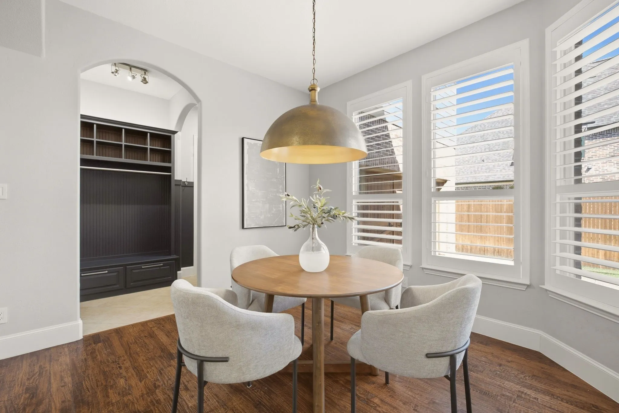 Large enough for any table shape, the breakfast area is both functional & comfortable. Access mudroom bench, big laundry room & the 2-car garage through the doorway.