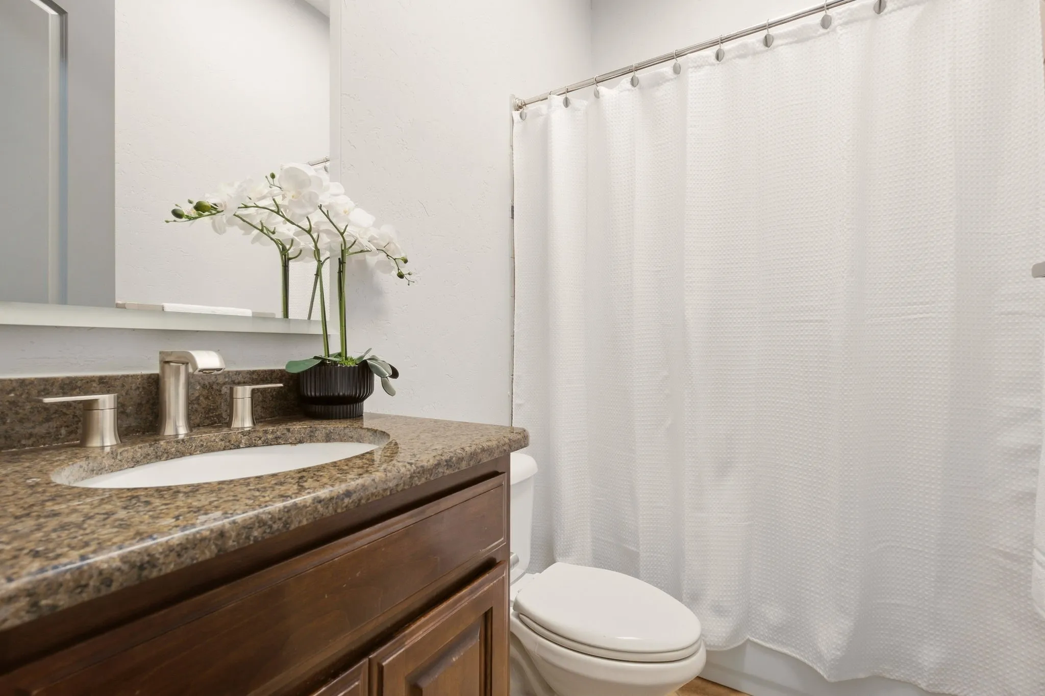 Full bath 2 (of 4 total) is on the first floor--convenient for family & guests.