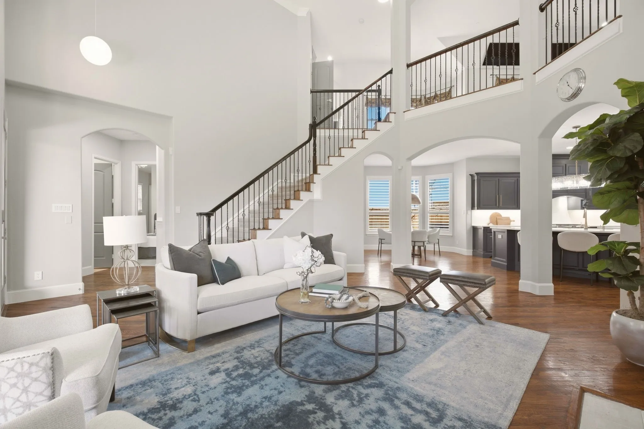 To the left of the staircase: guest bedroom & full bath + a homework center that makes an ideal second office or craft space.