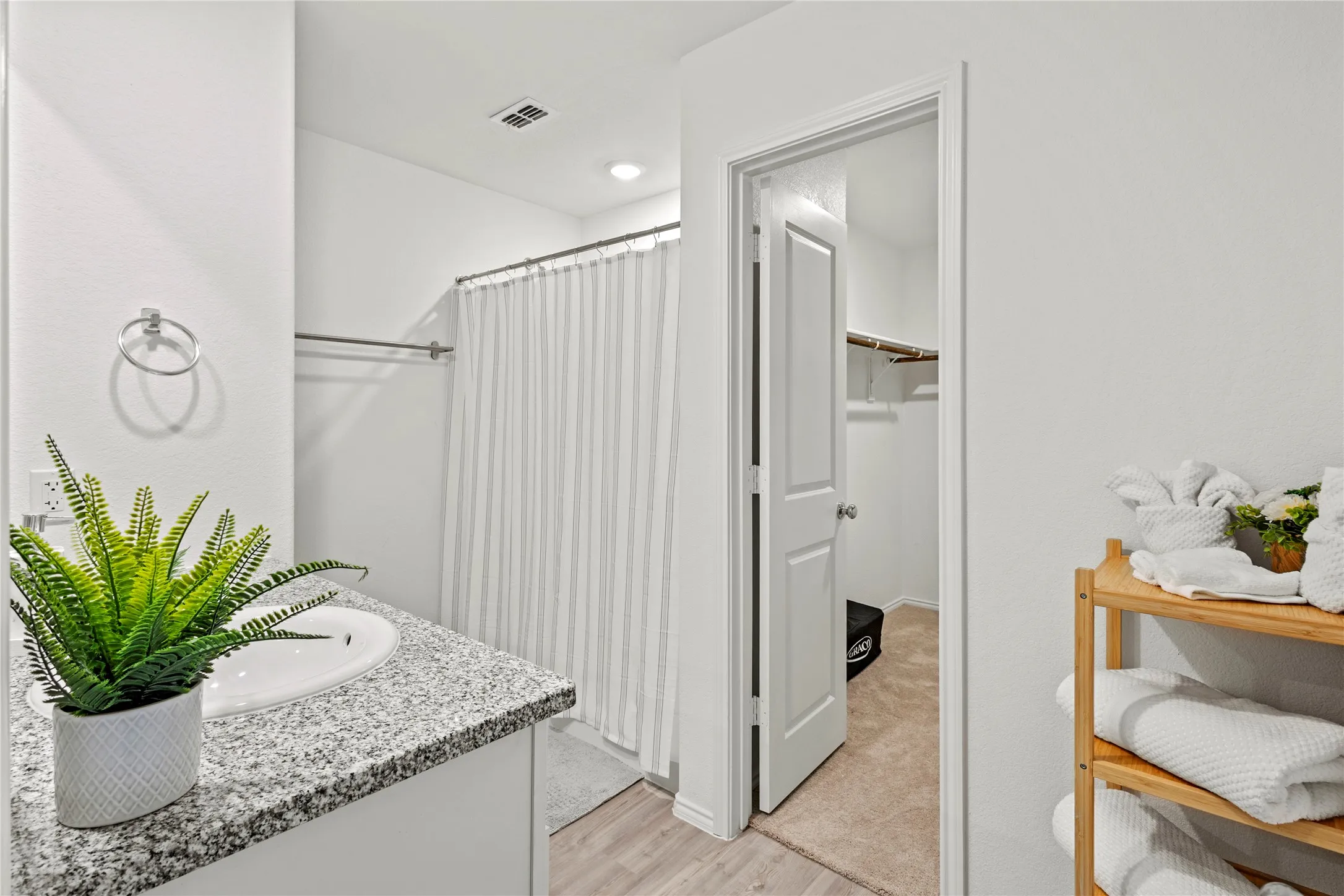 Vanity with integrated sink and granite-style countertop