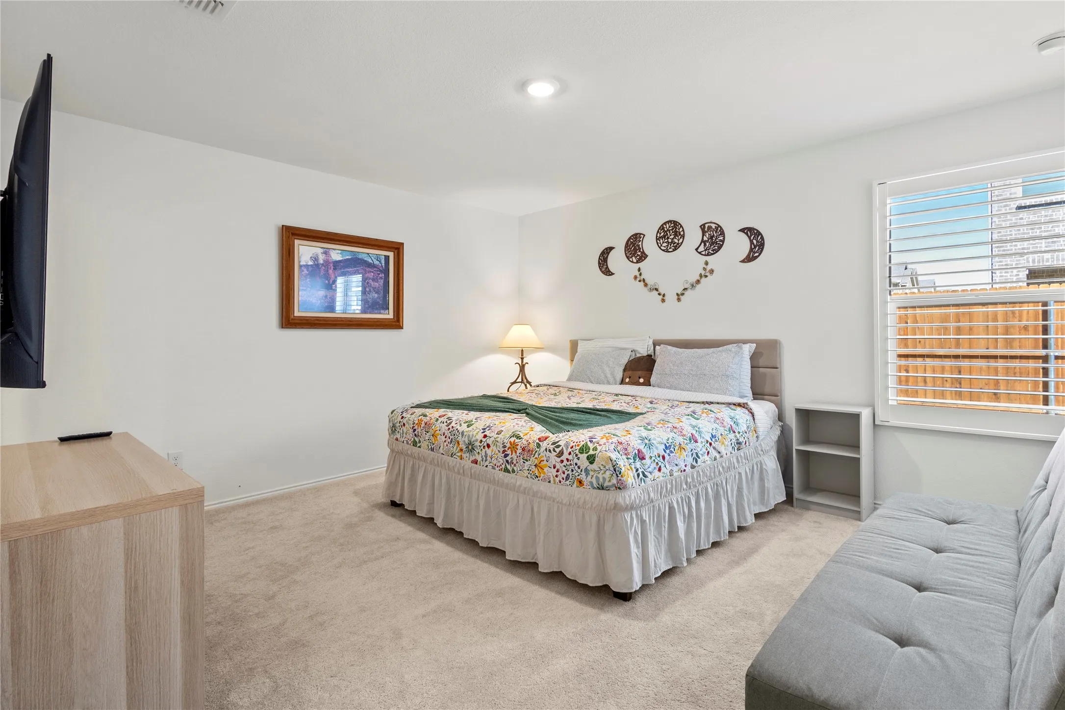 Carpeted flooring, recessed ceiling lighting, window with blinds, and white painted walls