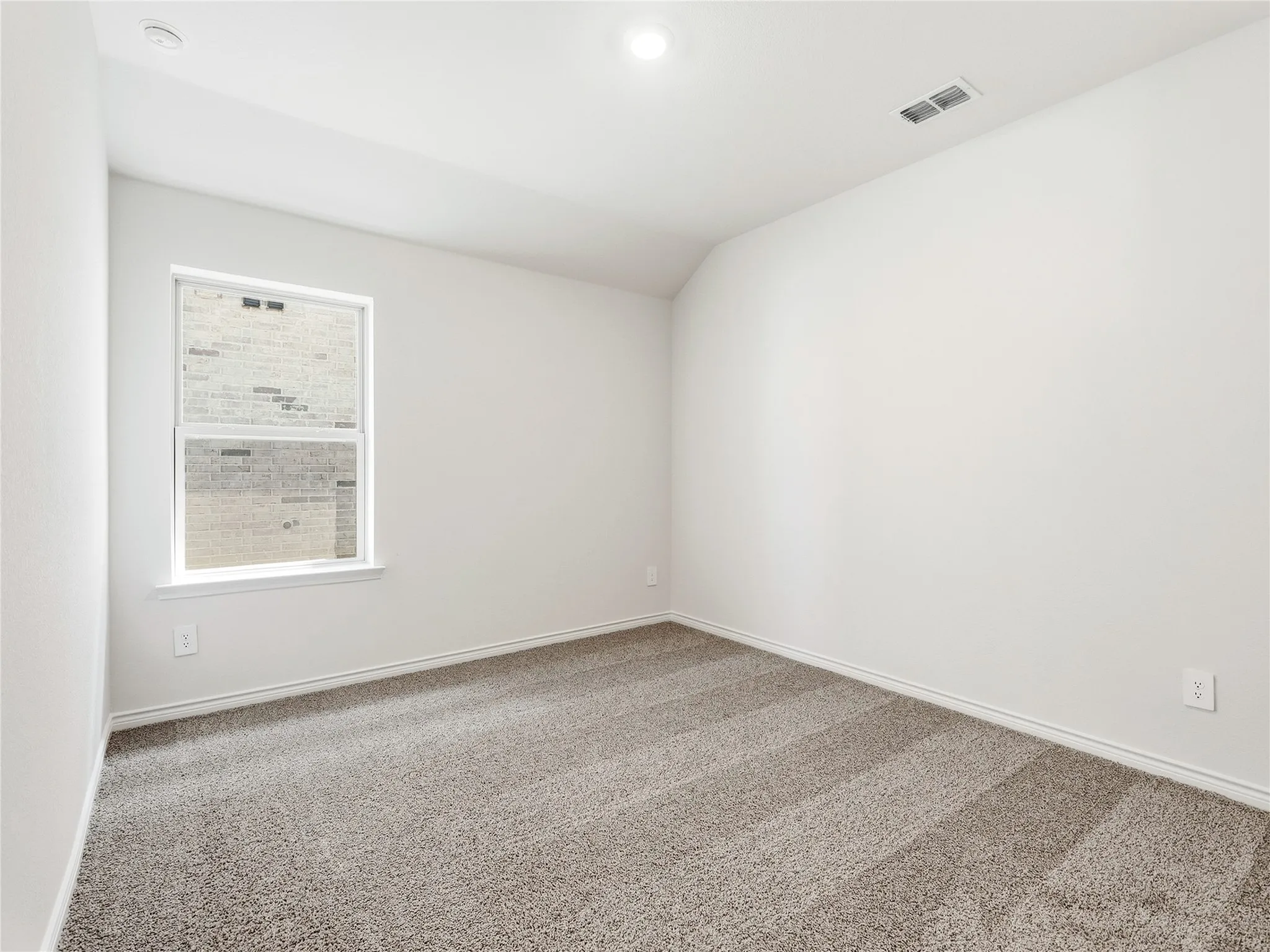#3 Neutral wall paint throughout, carpeted flooring, window with a white frame, and recessed lighting