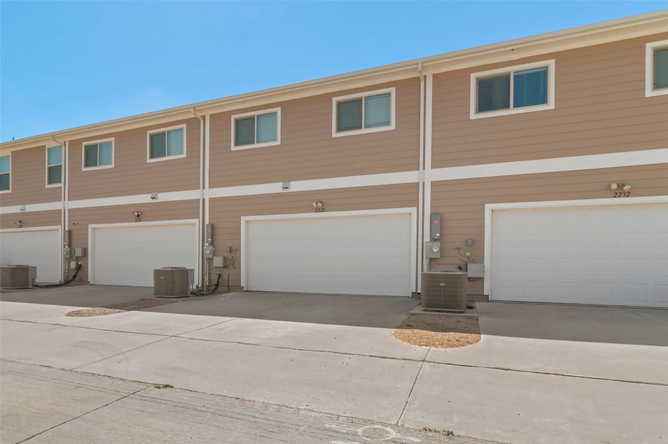 Garage for unit 2228 in the alley behind.