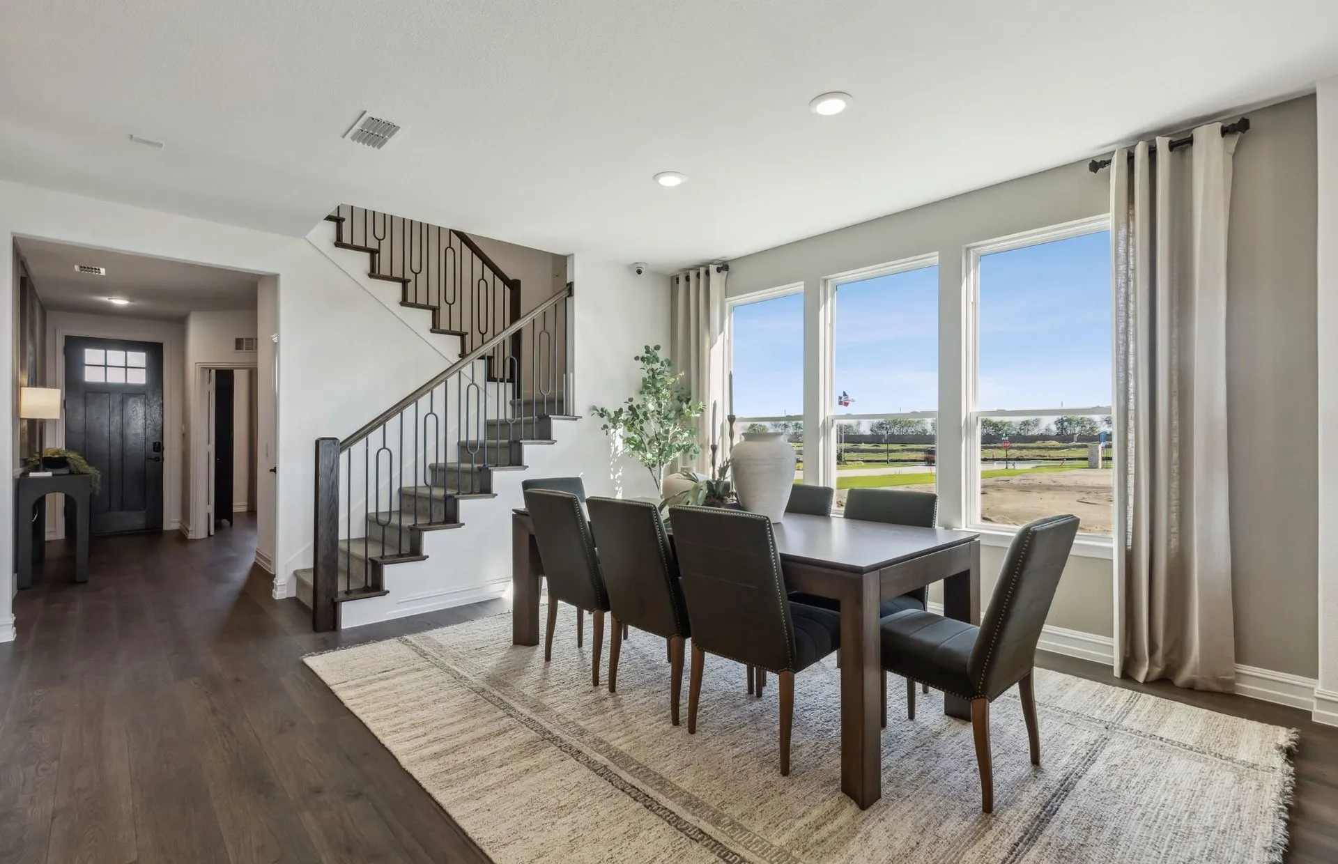 *Model Representation - Dining area off kitchen with large windows