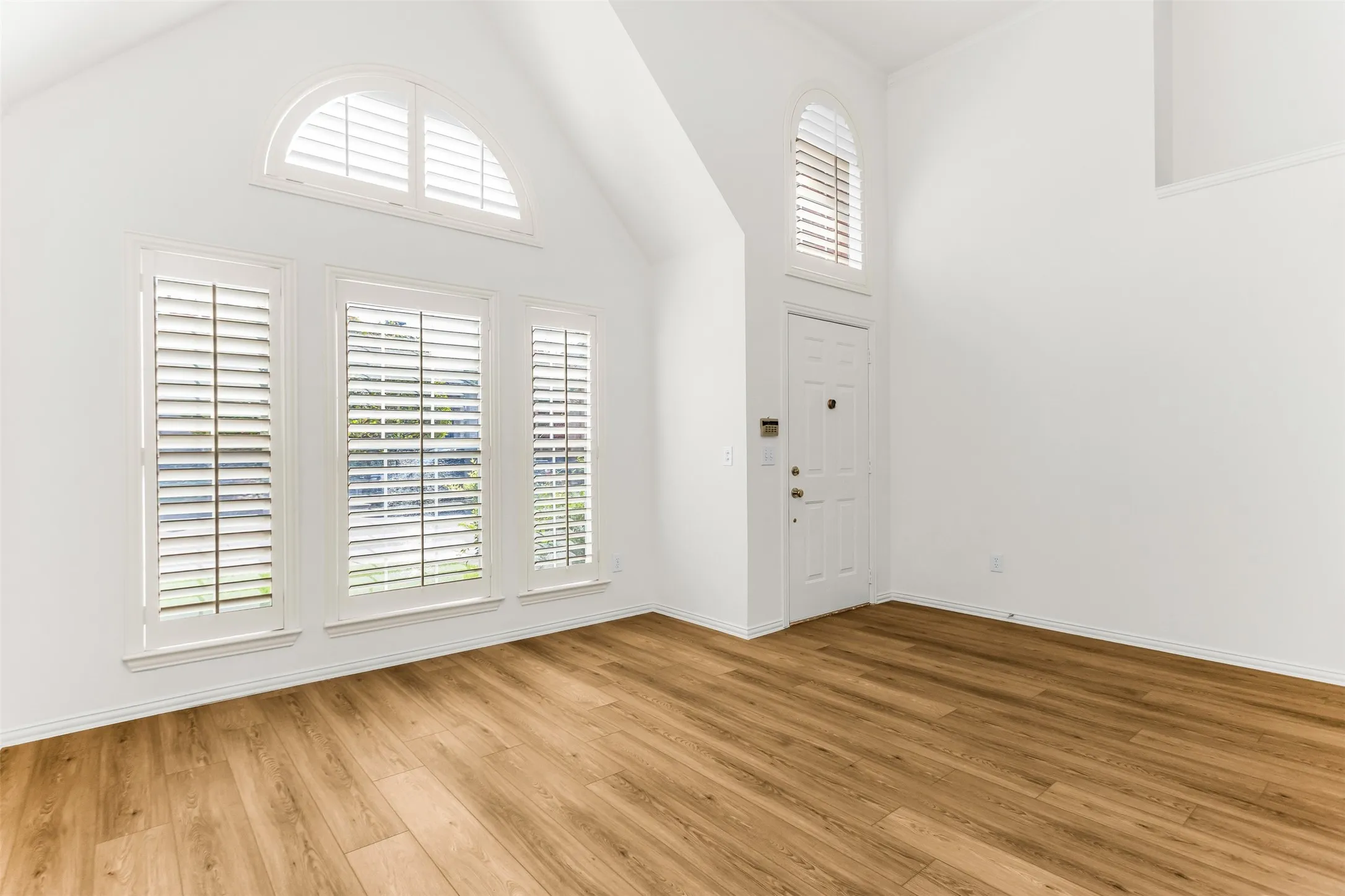 Living Room & Entry.  Sherwin Williams Alabaser White Walls, Trim, Door &U Ceilings!