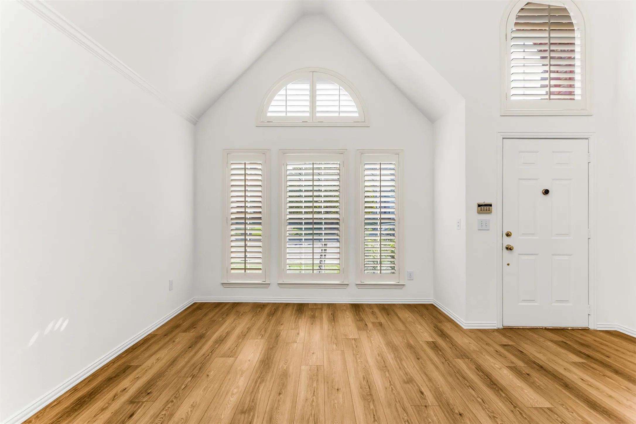 View Of Formal LR & Entry. Beautiful LVP Floors Throughout!