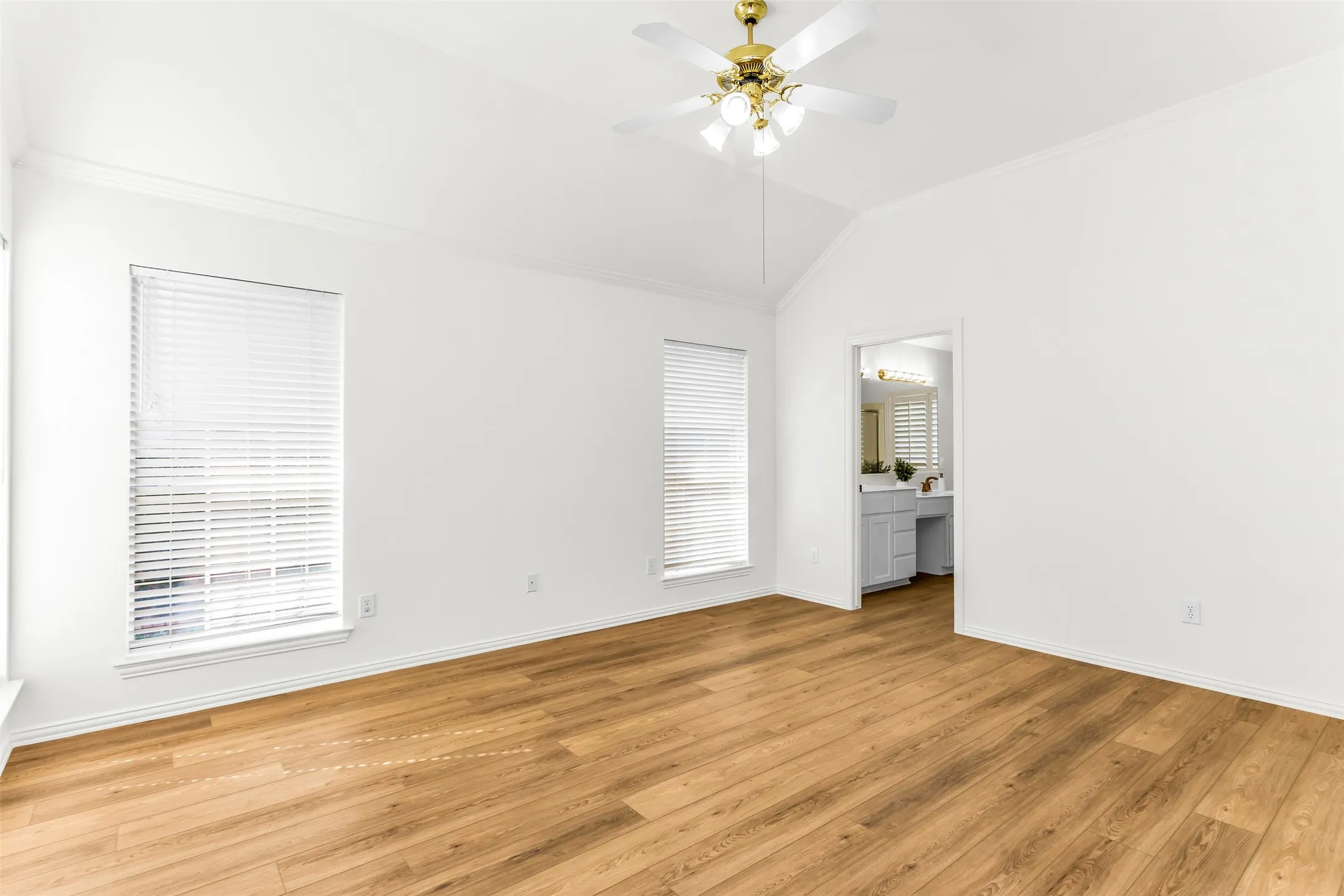 Primary Bedroom Has Ceiling Fan.