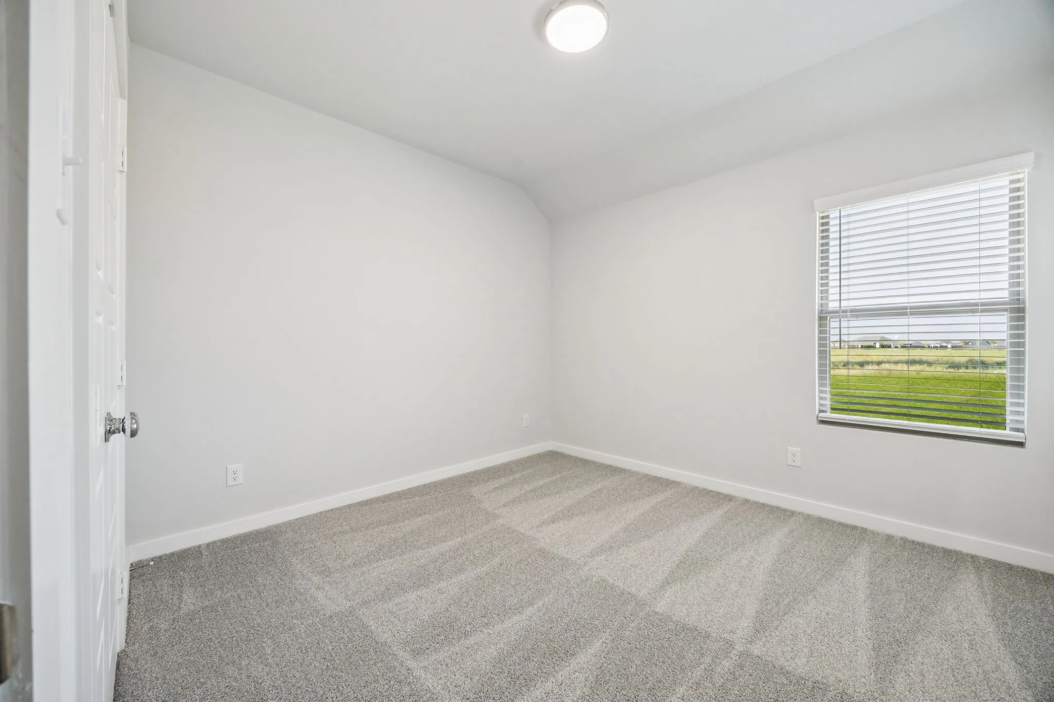 Bedroom in the Masters home plan by Trophy Signature Homes – REPRESENTATIVE PHOTO
