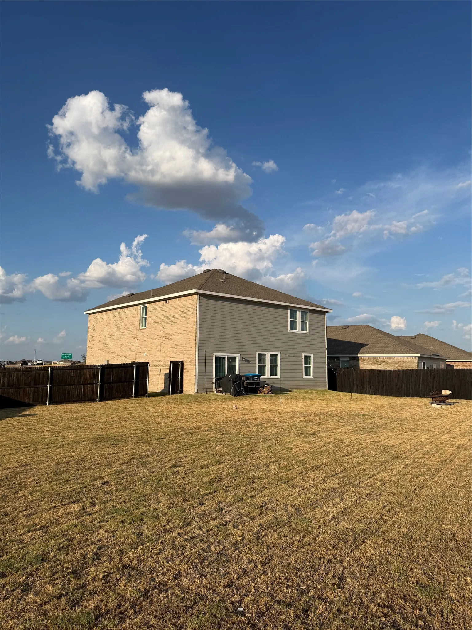 Spacious yard with a privacy fence