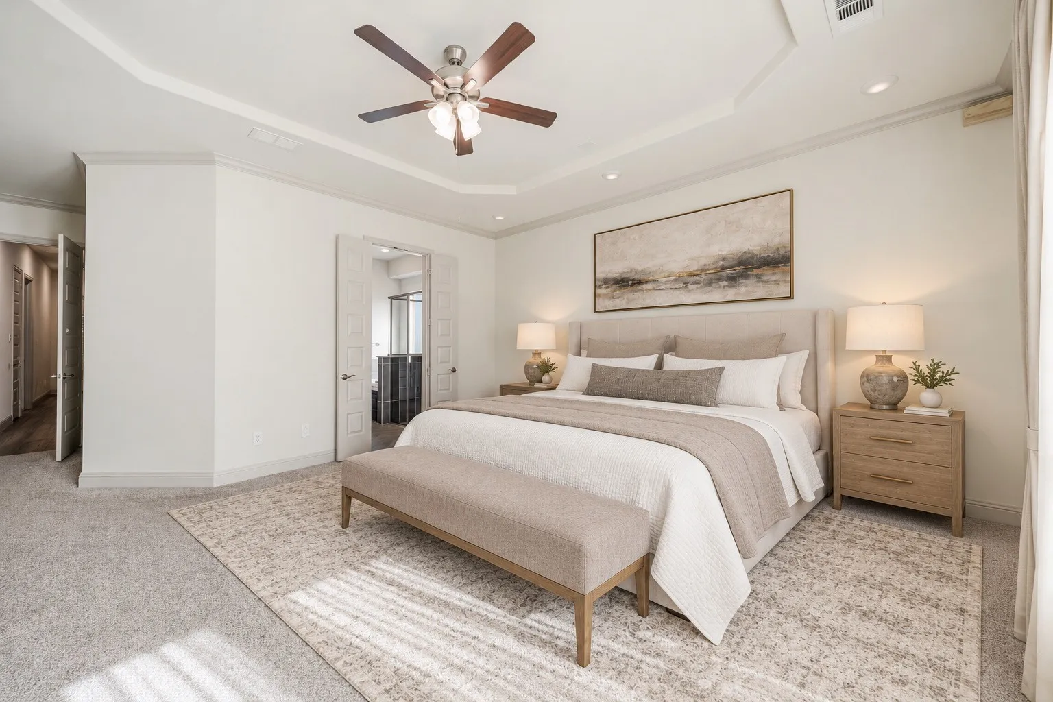 Recessed lighting and ceiling fan, tray ceiling with crown molding,  and expansive window openings-  Downstairs -staging with AI
