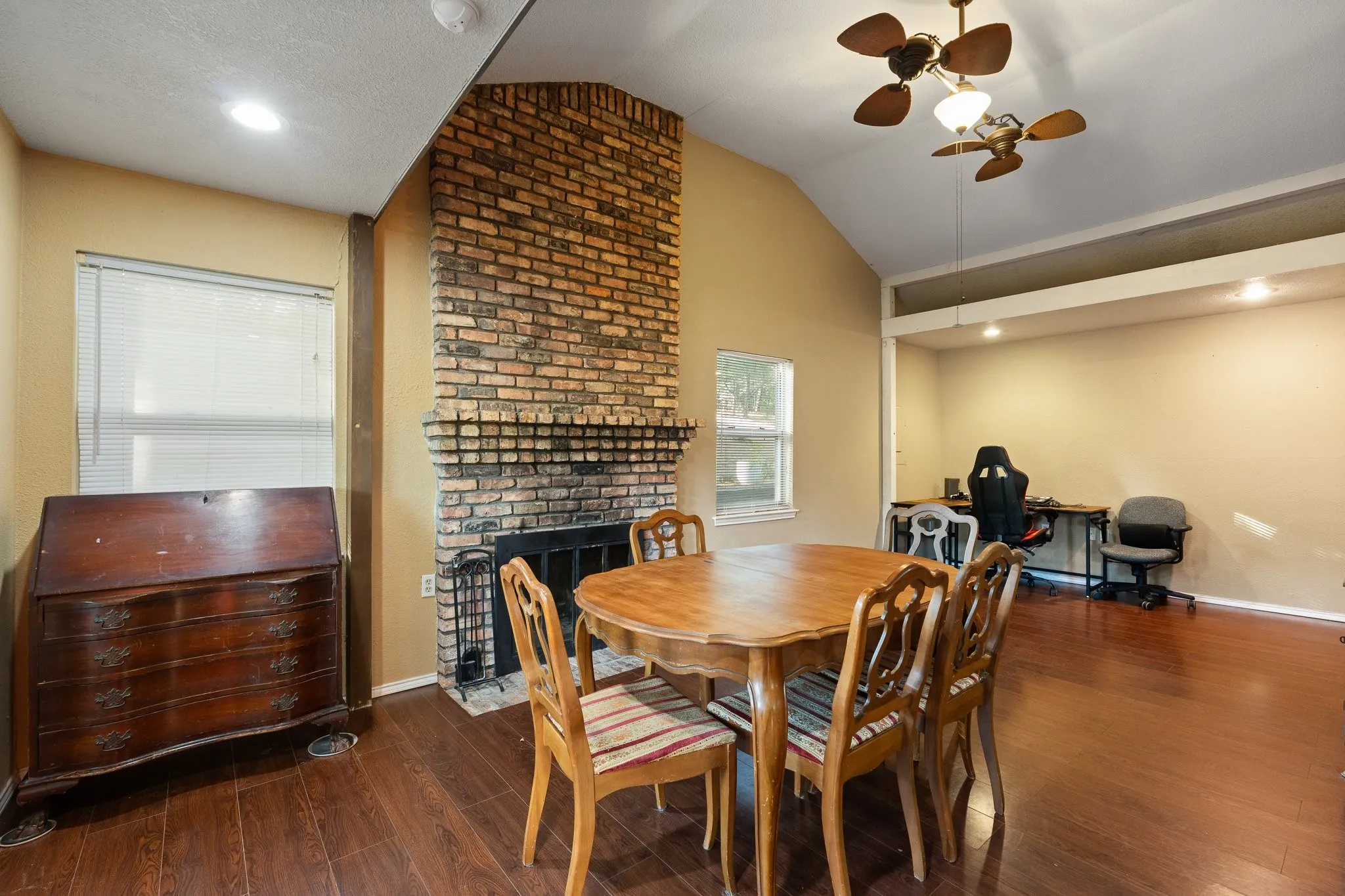 Varying ceiling heights, recessed lighting, and wood-finish flooring