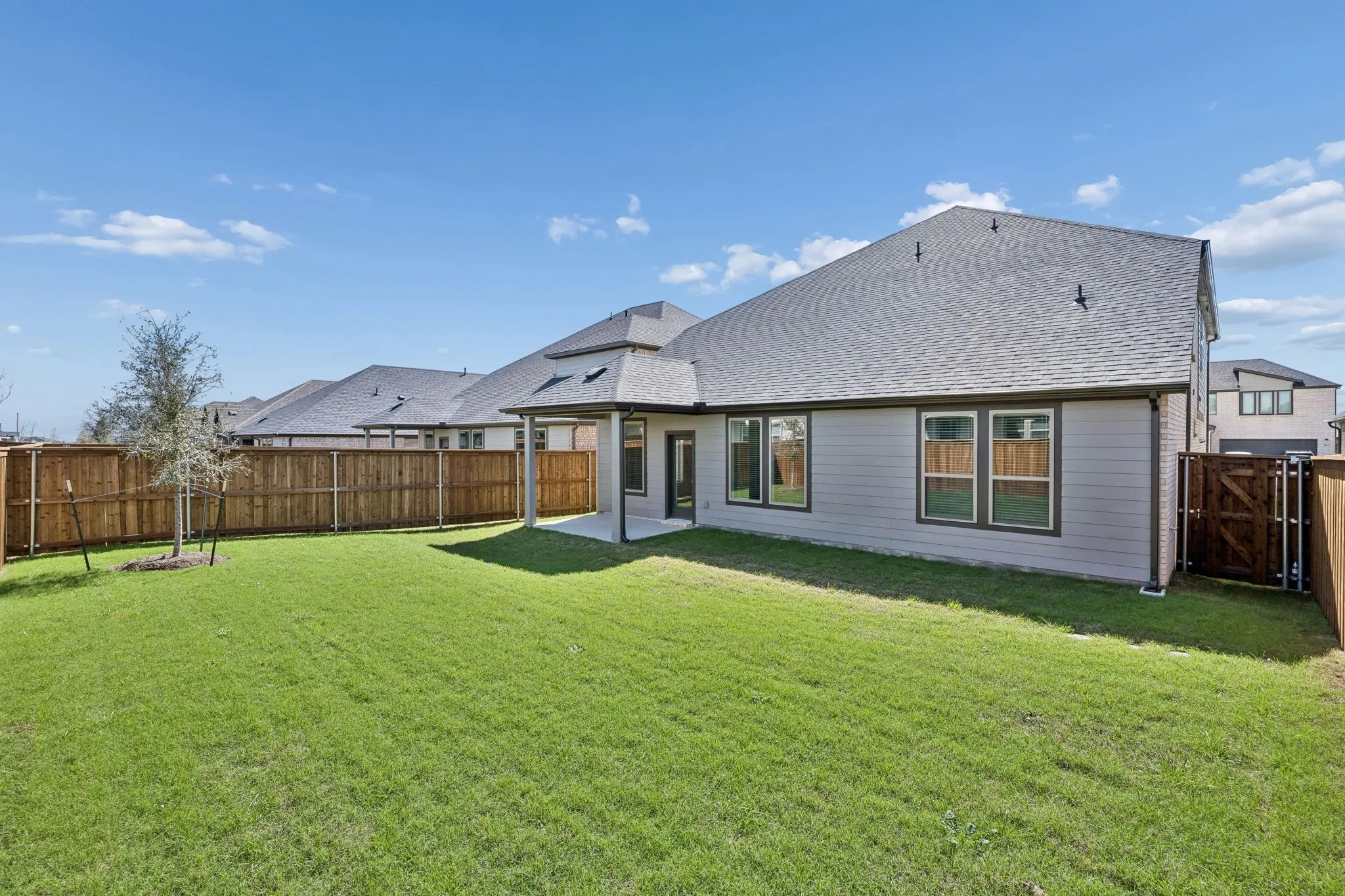 Covered Patio in the Winters home plan by Trophy Signature Homes – REPRESENTATIVE PHOTO