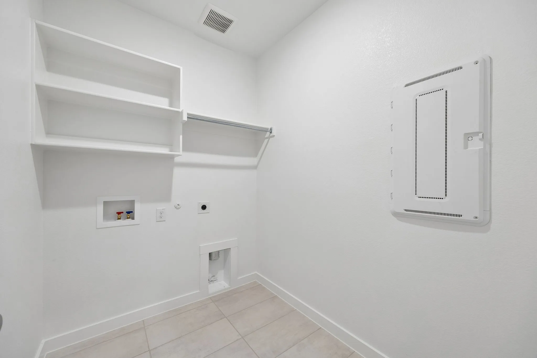Utility Room in the Winters home plan by Trophy Signature Homes – REPRESENTATIVE PHOTO