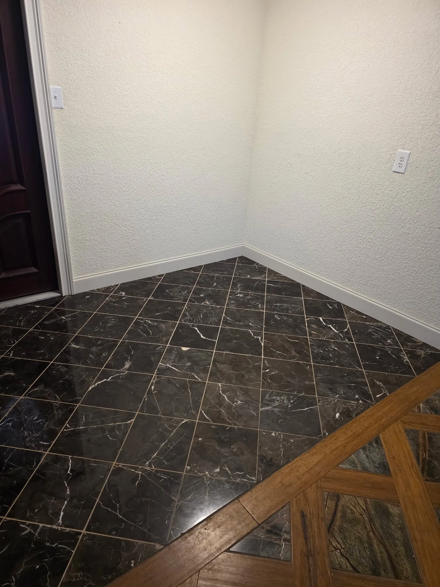 Empty room with baseboards
