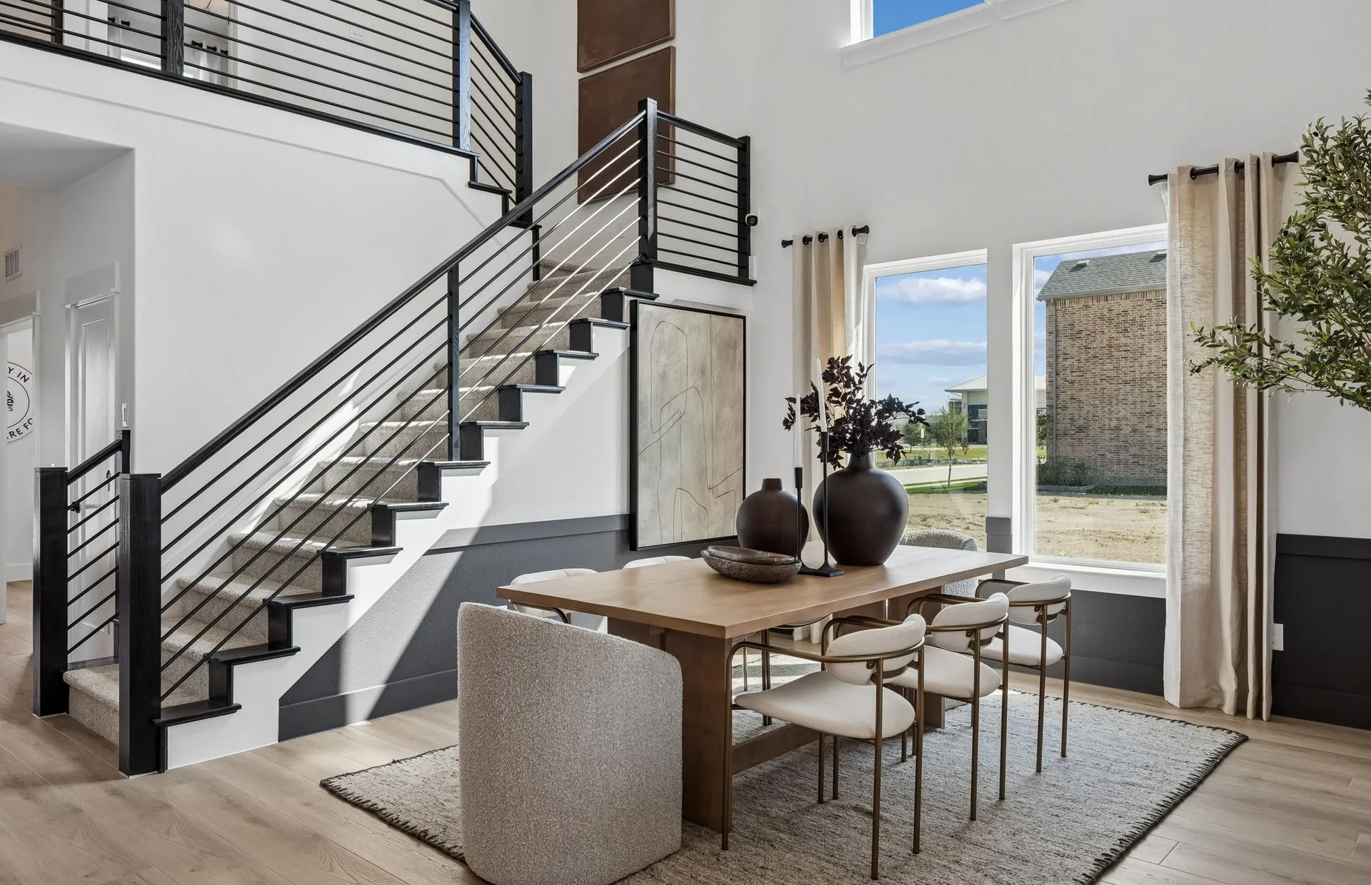 *Model Representation - Dining area off kitchen with large windows