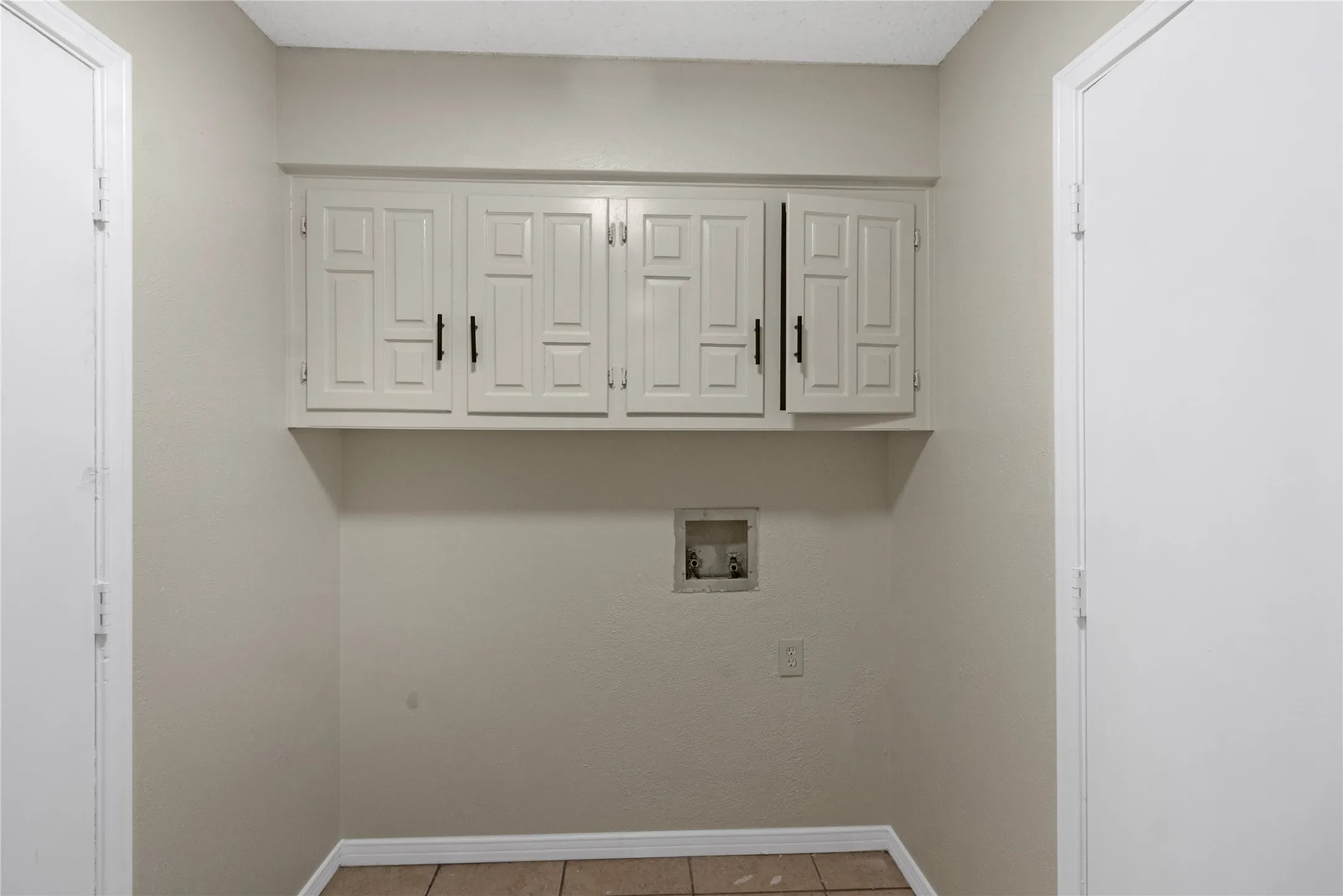 Wall-mounted cabinetry providing storage