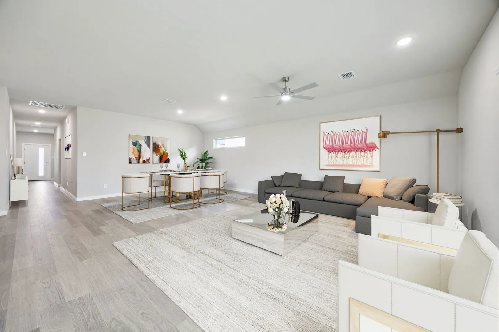 Dining and Living Room in the Hayden home plan by Trophy Signature Homes – REPRESENTATIVE PHOTO