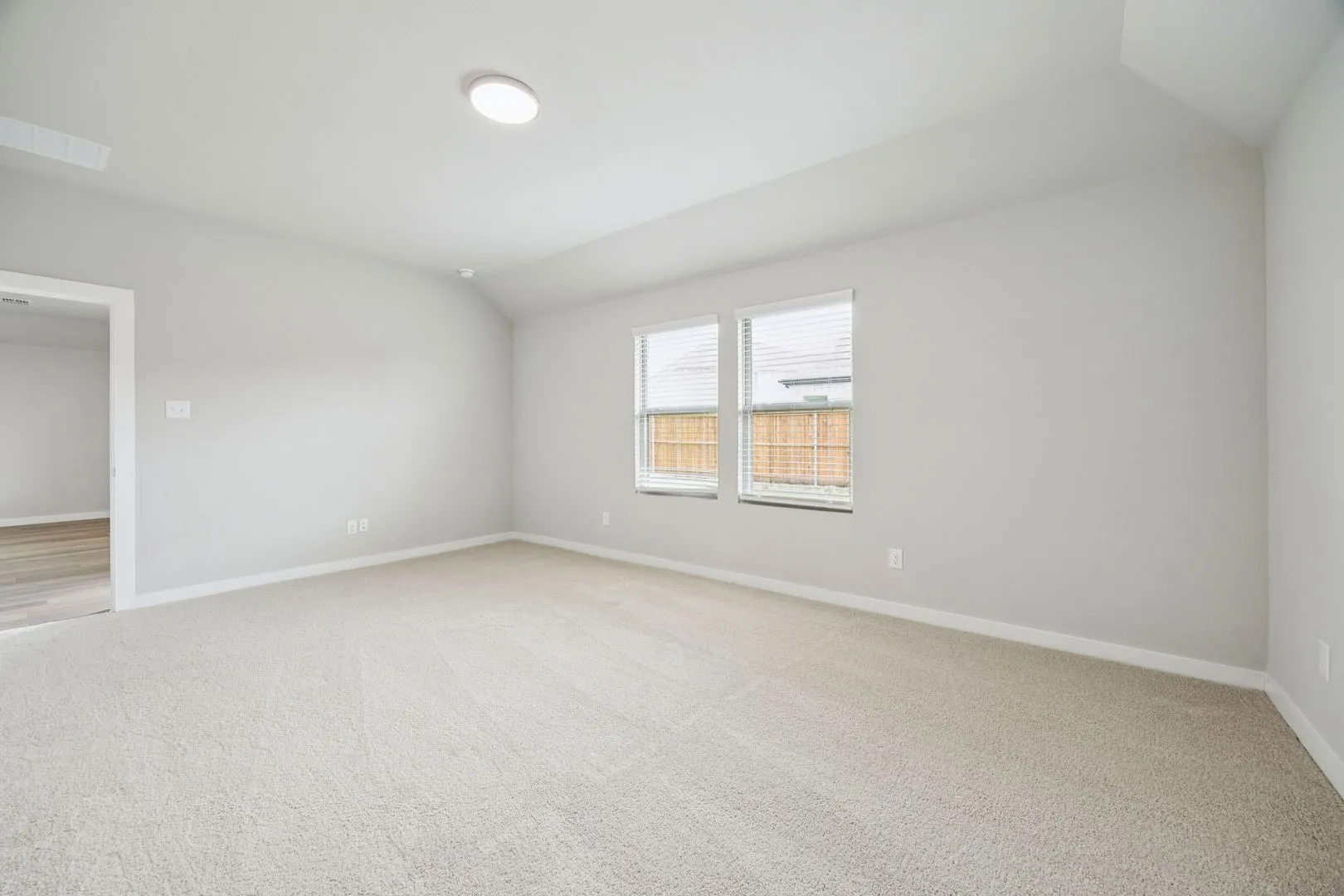 Primary Suite in the Hayden home plan by Trophy Signature Homes – REPRESENTATIVE PHOTO