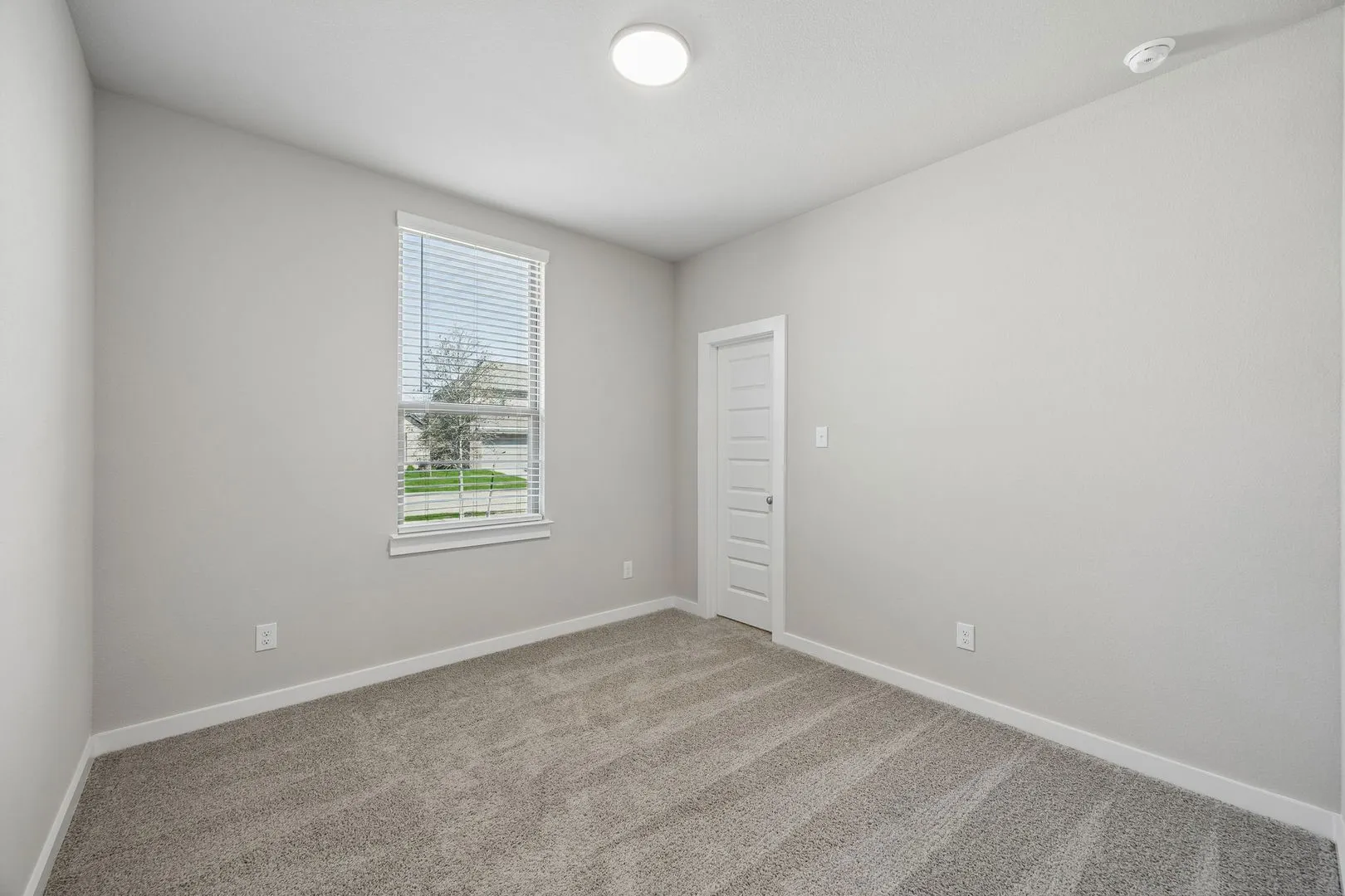 Bedroom in the Emmy II home plan by Trophy Signature Homes - REPRESENTATIVE PHOTO