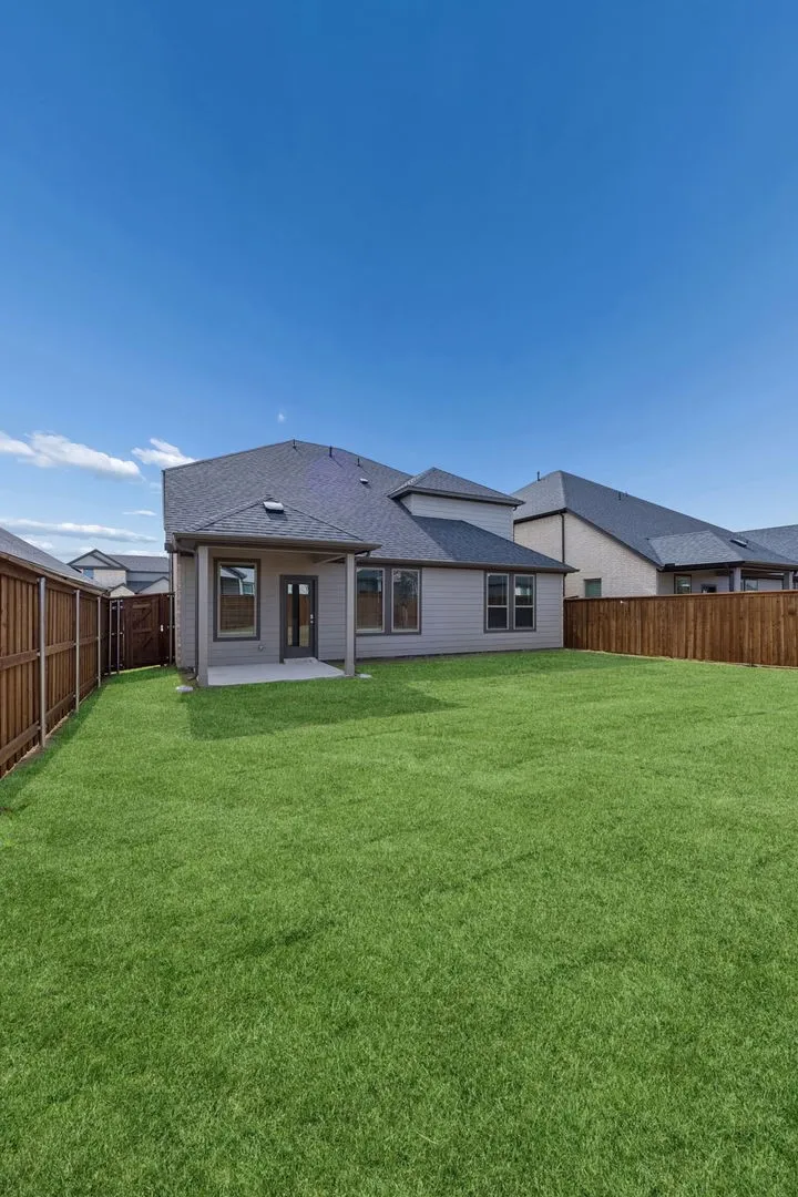 Covered Patio in the Masters home plan by Trophy Signature Homes – REPRESENTATIVE PHOTO
