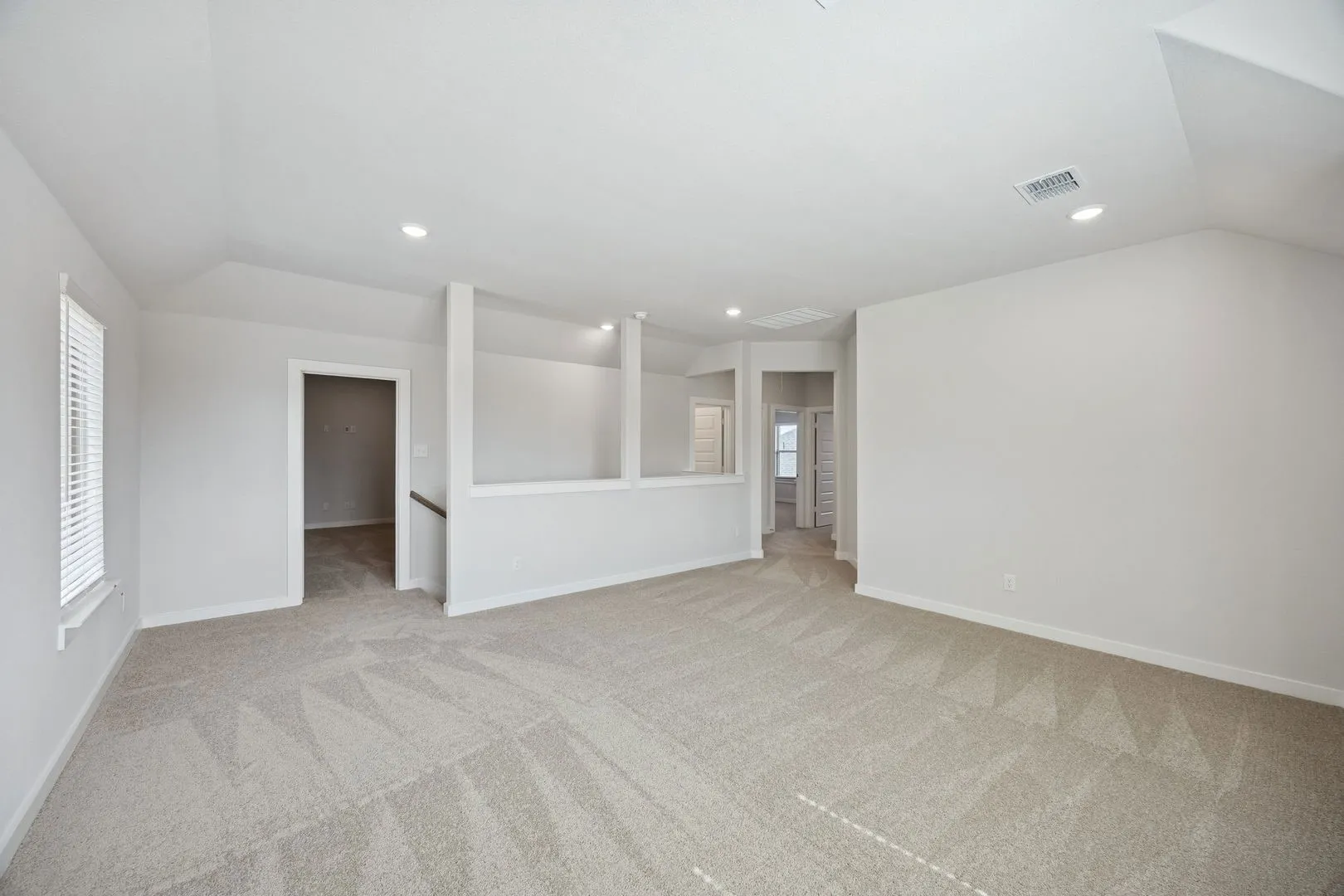Game room in the Masters home plan by Trophy Signature Homes – REPRESENTATIVE PHOTO