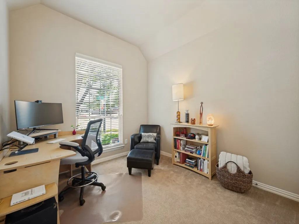 The second front bedroom offers a comfortable 11x12 layout with a spacious double-door closet, making it an ideal retreat for family, guests, or a home office.