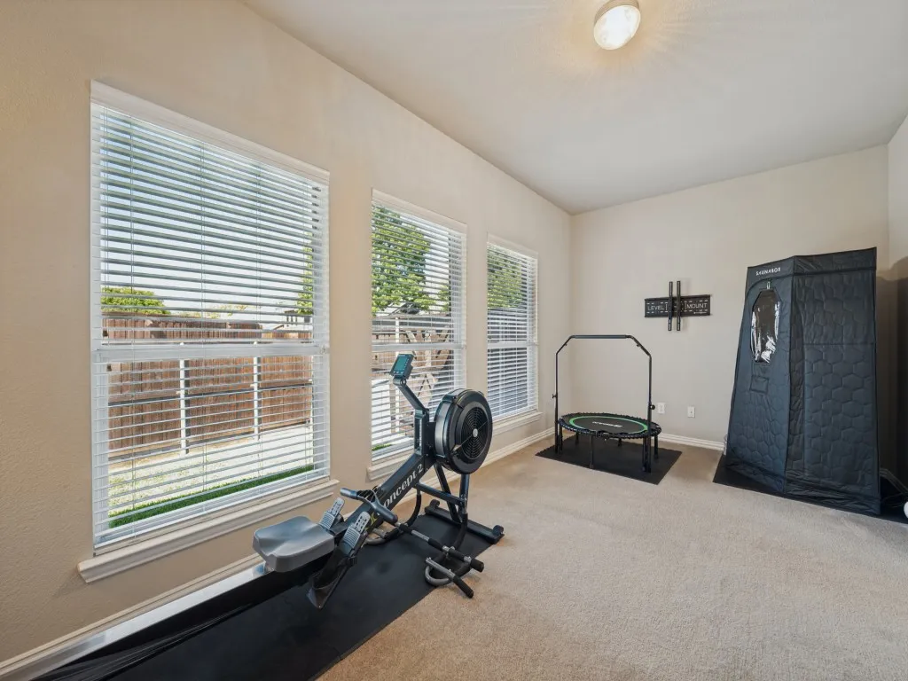 Located just beyond the primary bedroom and bath, this versatile flex room offers endless possibilities. Use it as a private home office, workout space, nursery, or cozy retreat to suit your lifestyle.