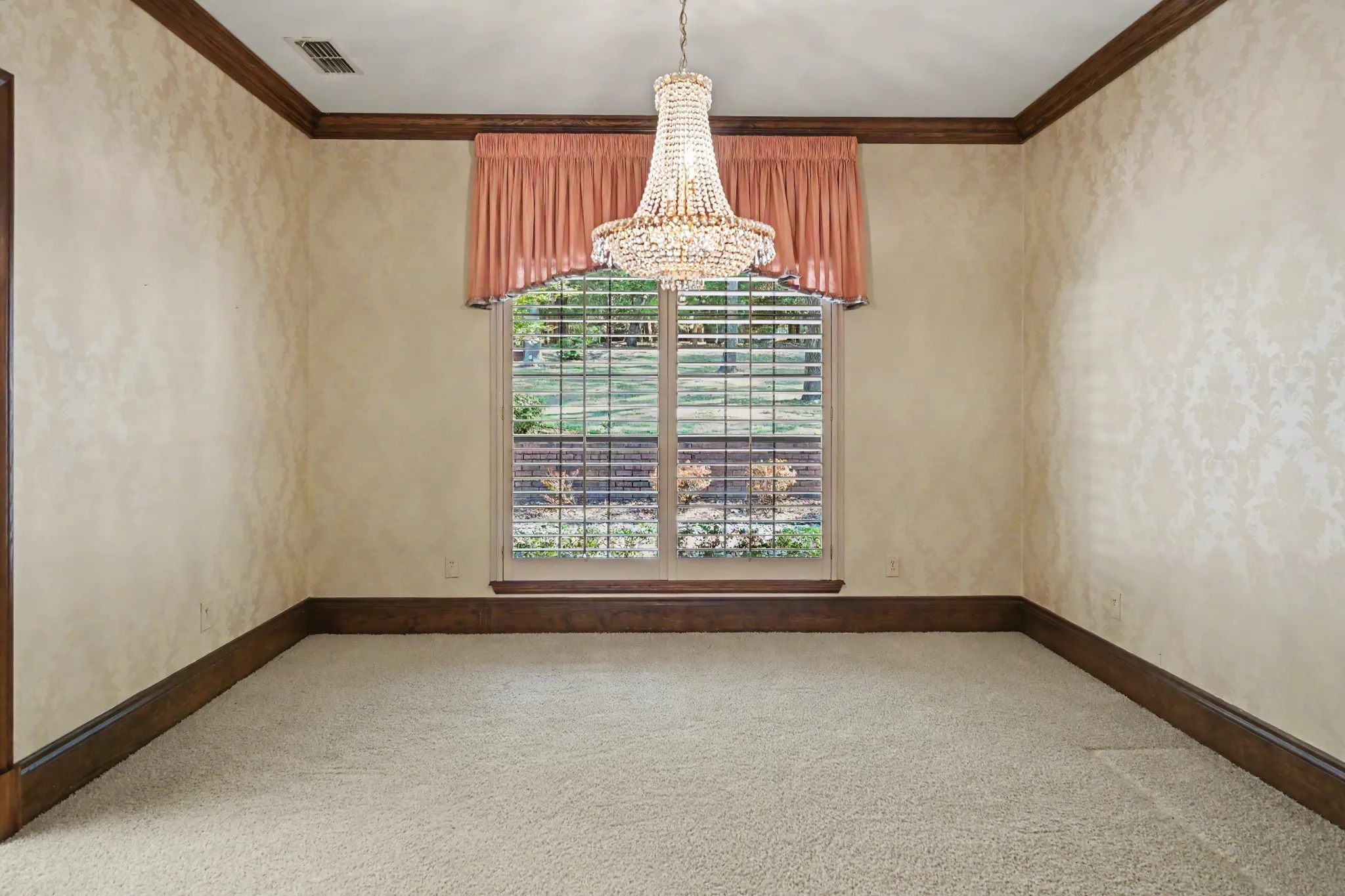 Formal dining accommodates a large table