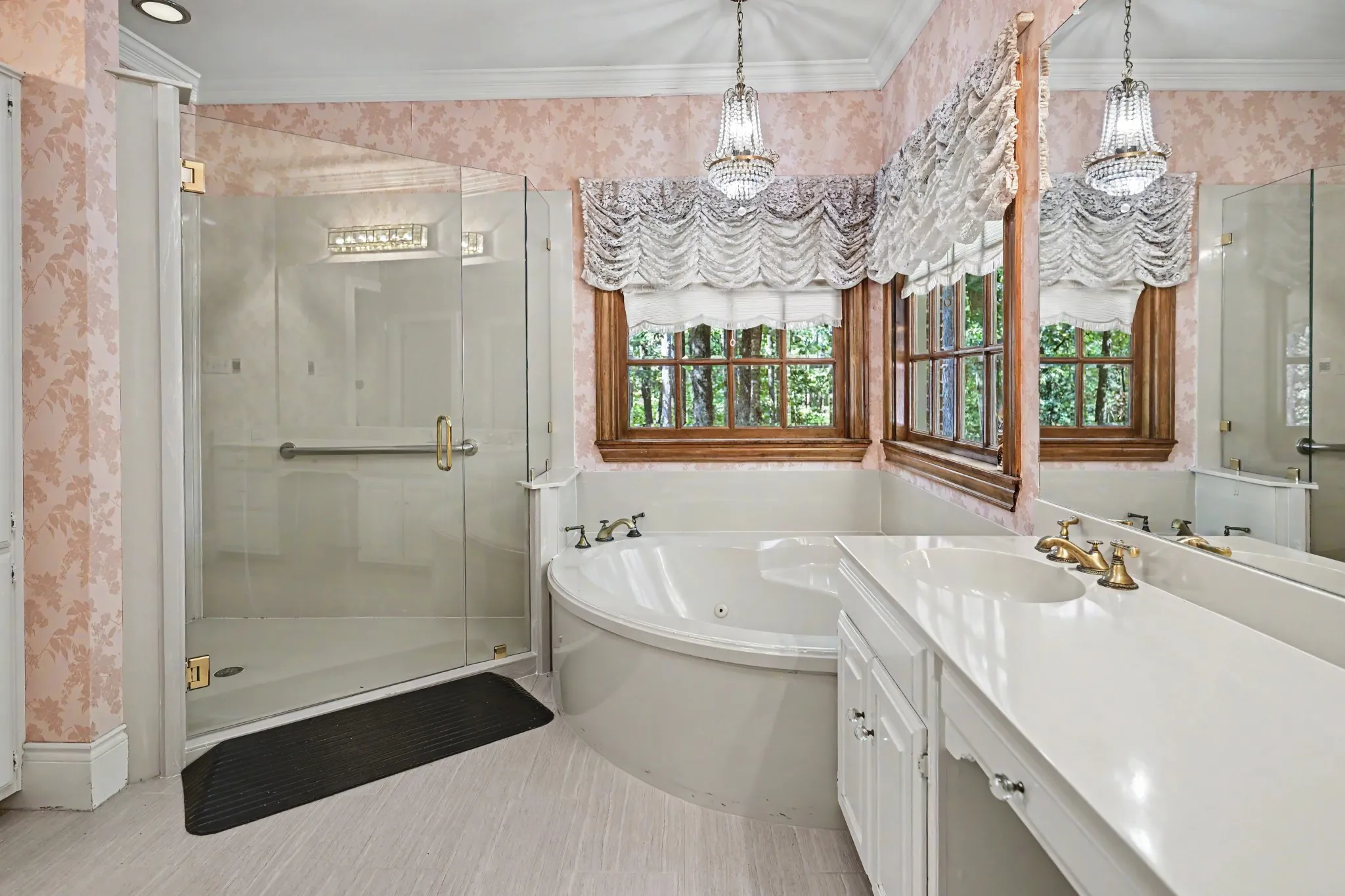 Frameliss shower plus jetted tub in primary bath