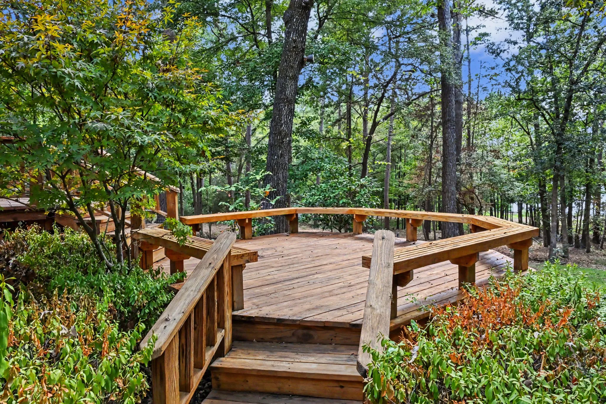 Lower deck with built-in bench seating is wired with electricity and is hot-tub ready!