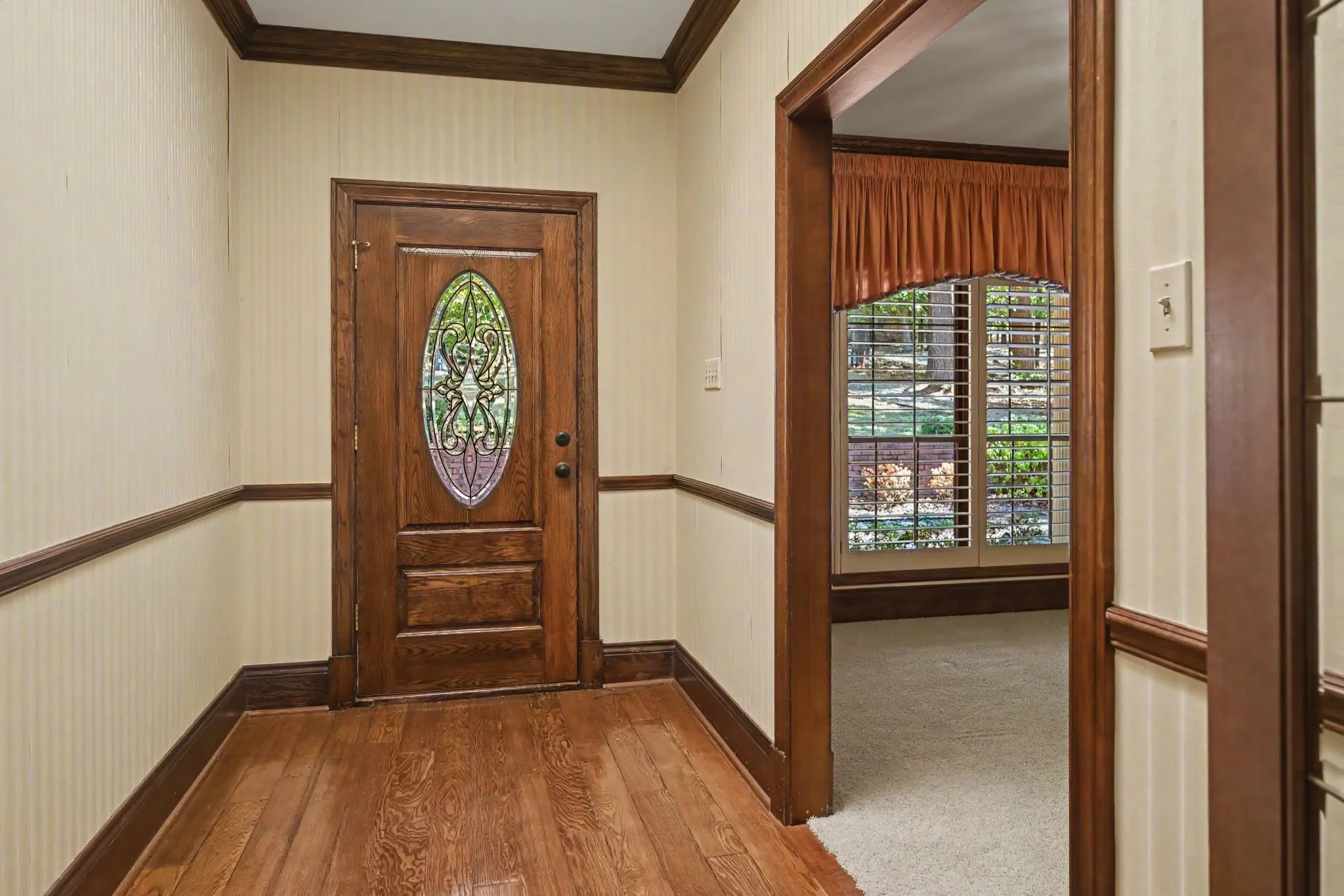 Welcoming entryway with skylight