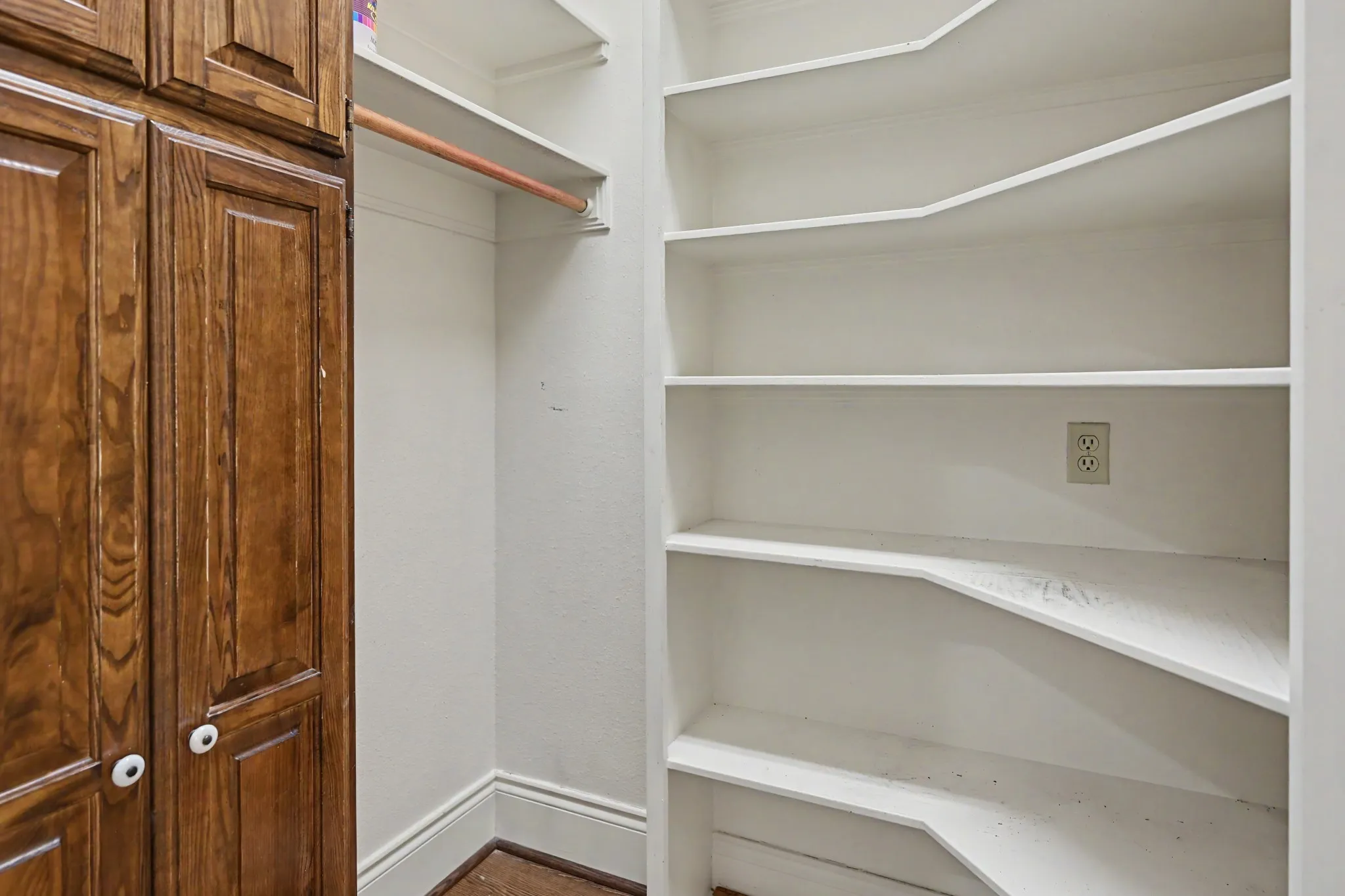 Storage off of laundry makes perfect overflow pantry and-or  utility closet