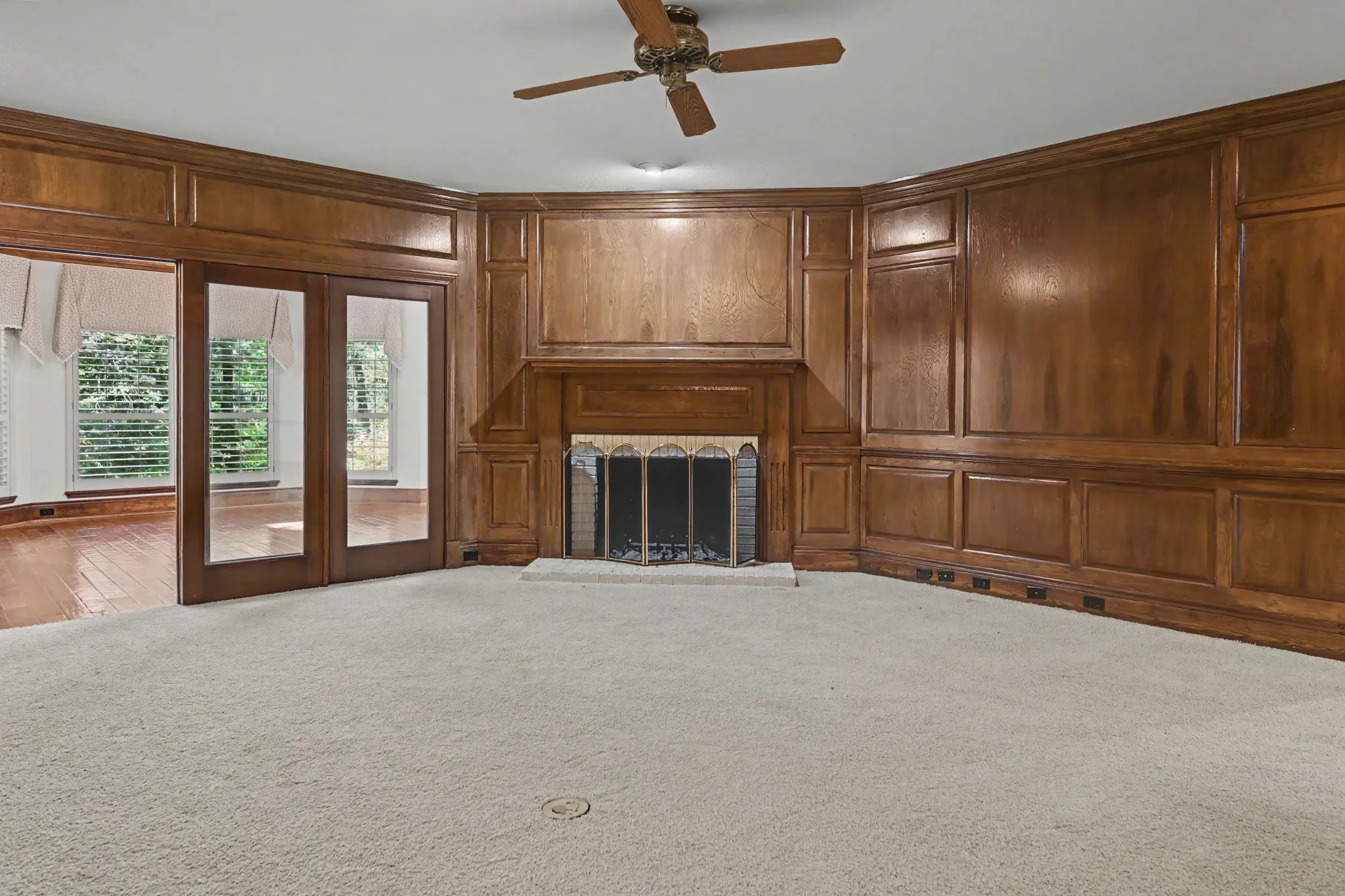 Classic wood paneled walls can remain stained or can be painted