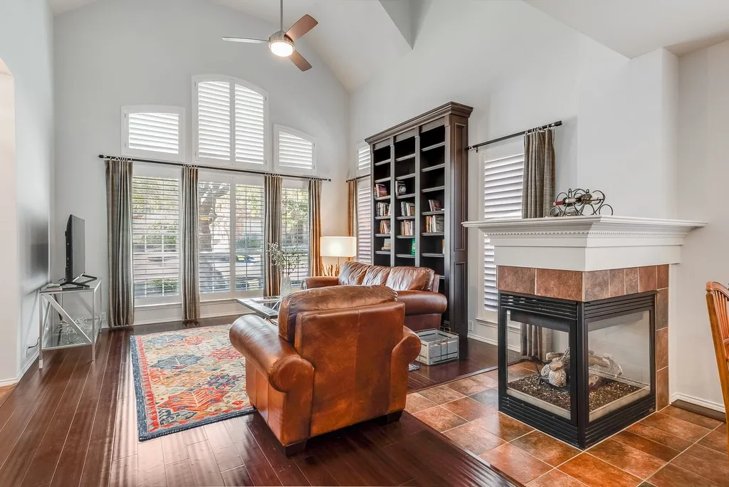 See Through Gas Fireplace Shared By the Living Space and Dining Space.