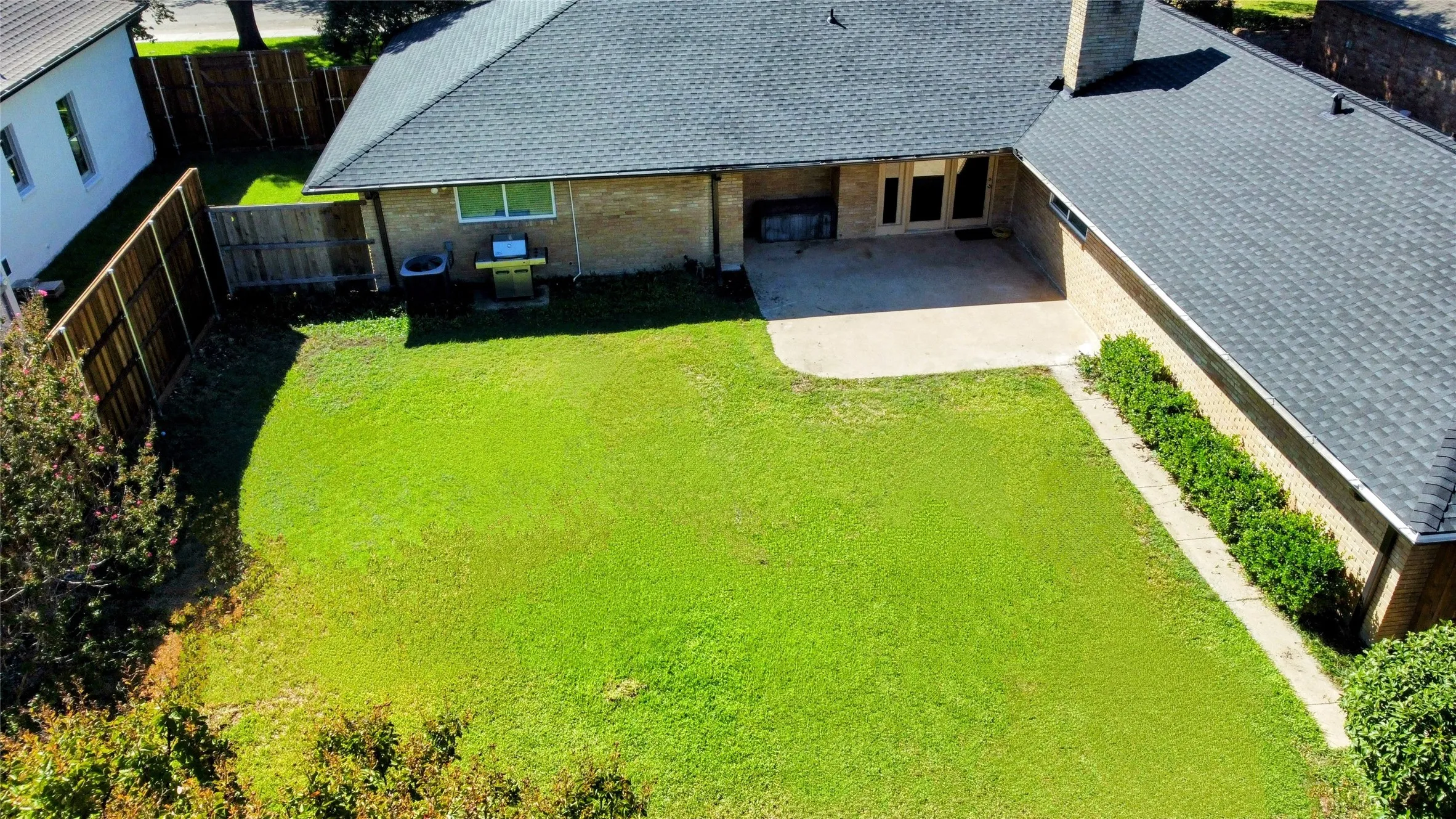 Aerial view of backyard and back patio