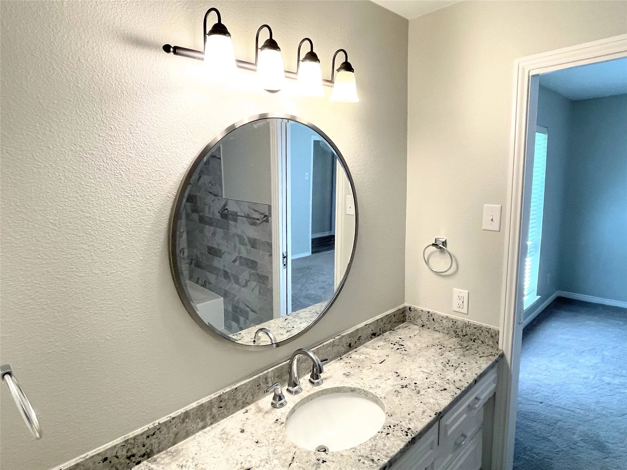 Jack and Jill bathroom with vanity
