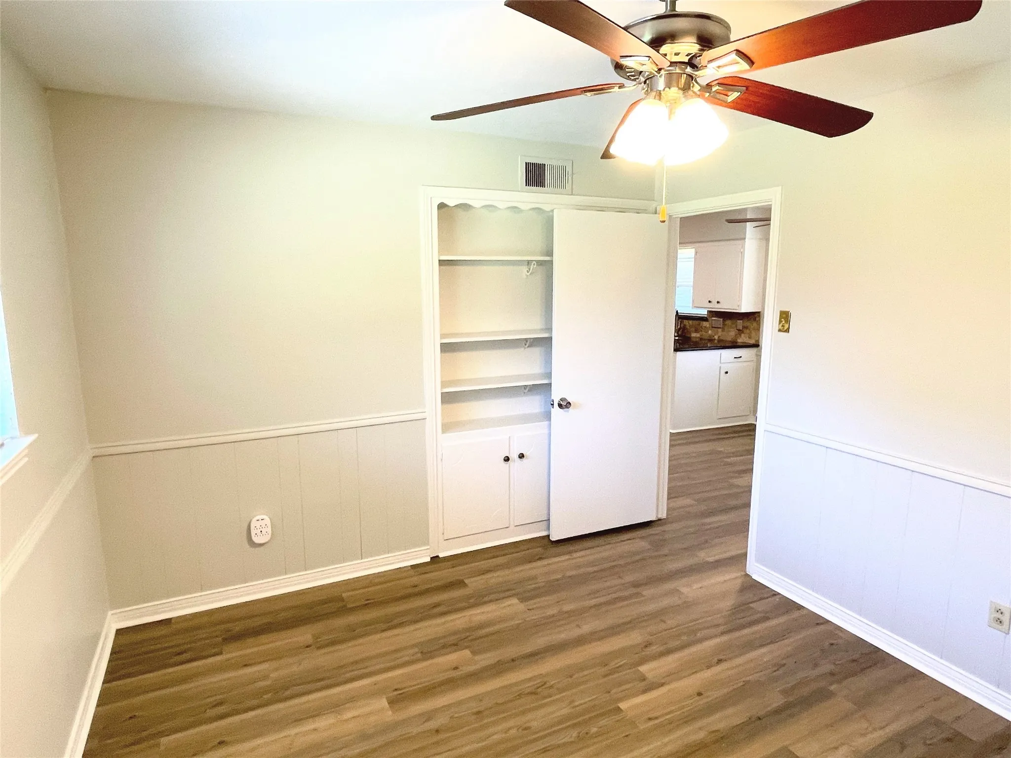 Bedroom or Office featuring ceiling fan and dark wood-type flooring