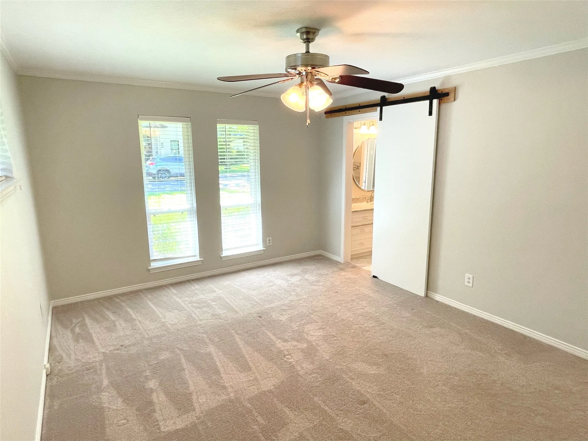 Bedroom 3 with crown molding and ceiling fan