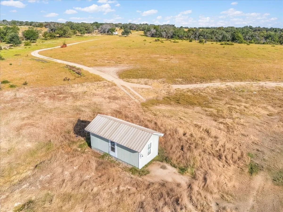 Small 12' by 24' tiny home could be removed or left to live in while construction of larger home.