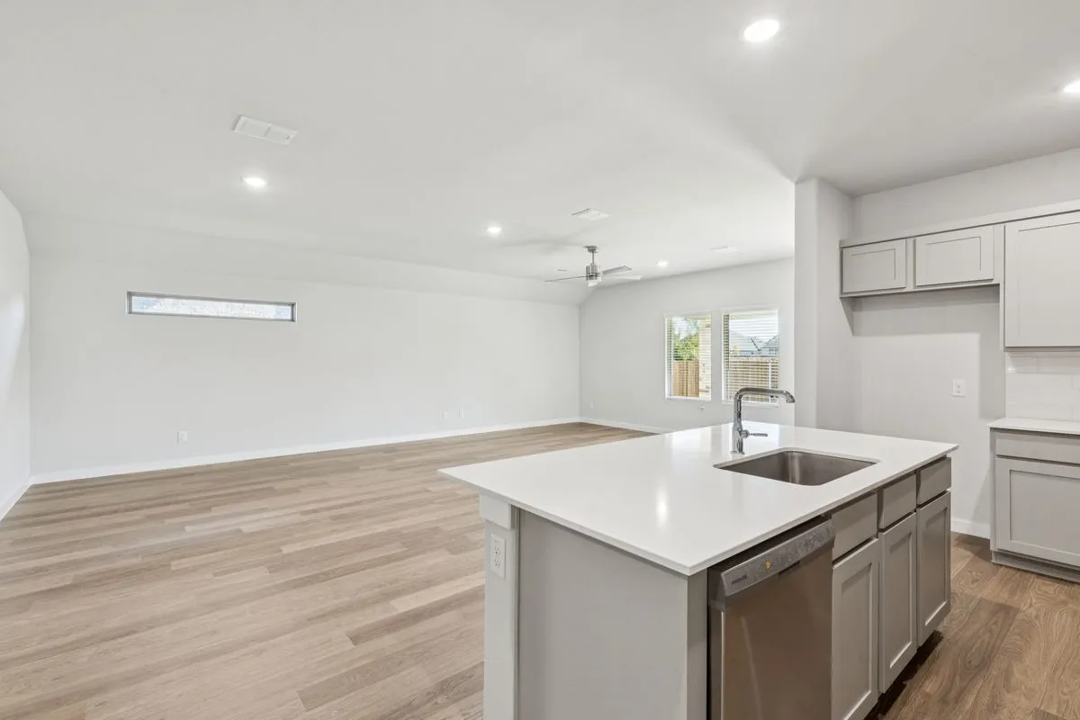 Open Floor Plan in the Oscar home plan by Trophy Signature Homes – REPRESENTATIVE PHOTO