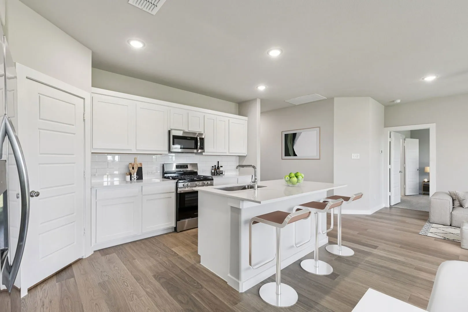 Kitchen in the Harper home plan by Trophy Signature Homes – REPRESENTATIVE PHOTO