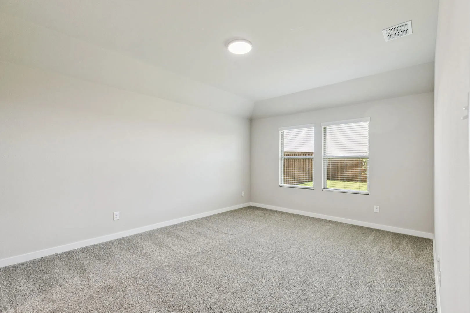 Primary Suite in the Harper home plan by Trophy Signature Homes – REPRESENTATIVE PHOTO