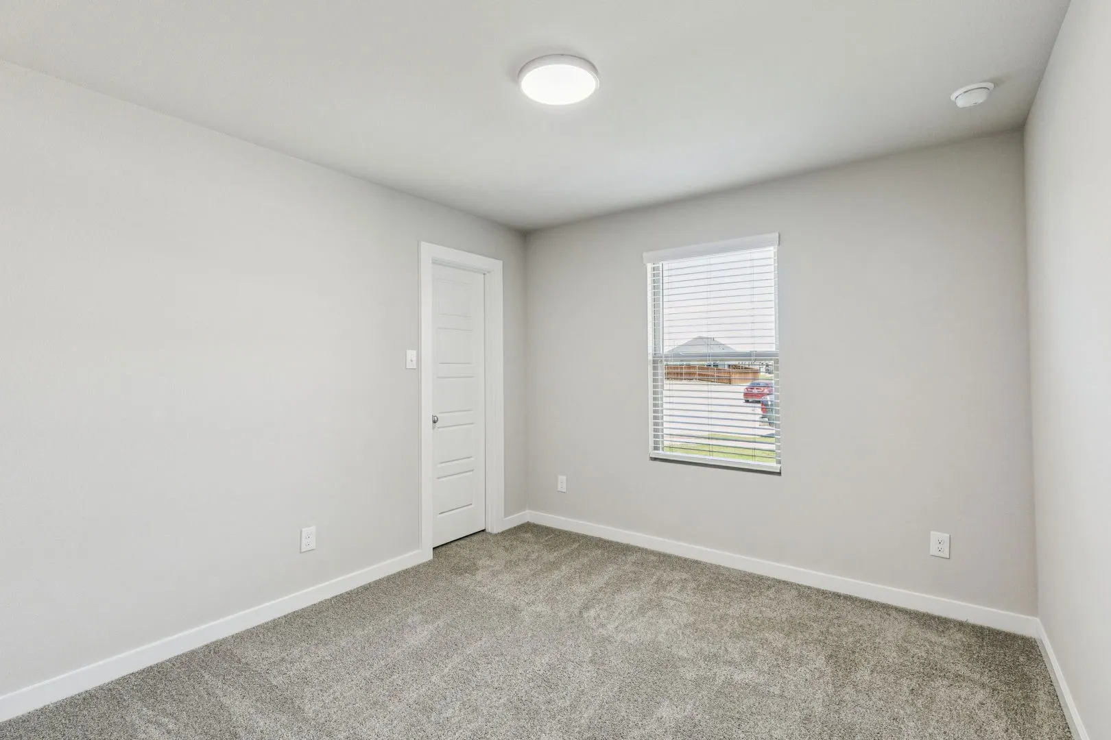 Bedroom in the Harper home plan by Trophy Signature Homes – REPRESENTATIVE PHOTO