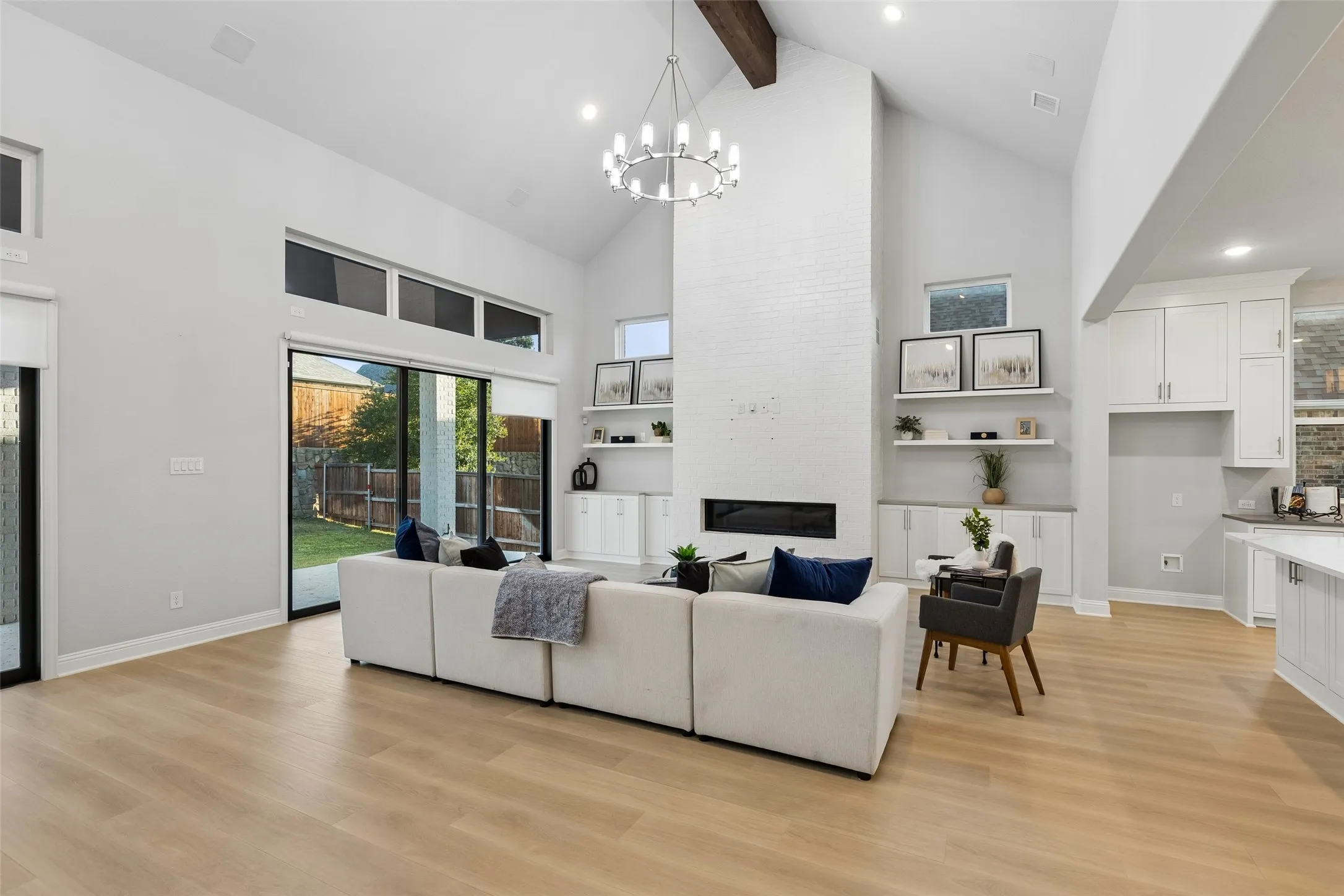 Cathedral ceilings, grand chandeliers and that fireplace really set the scene for your life.