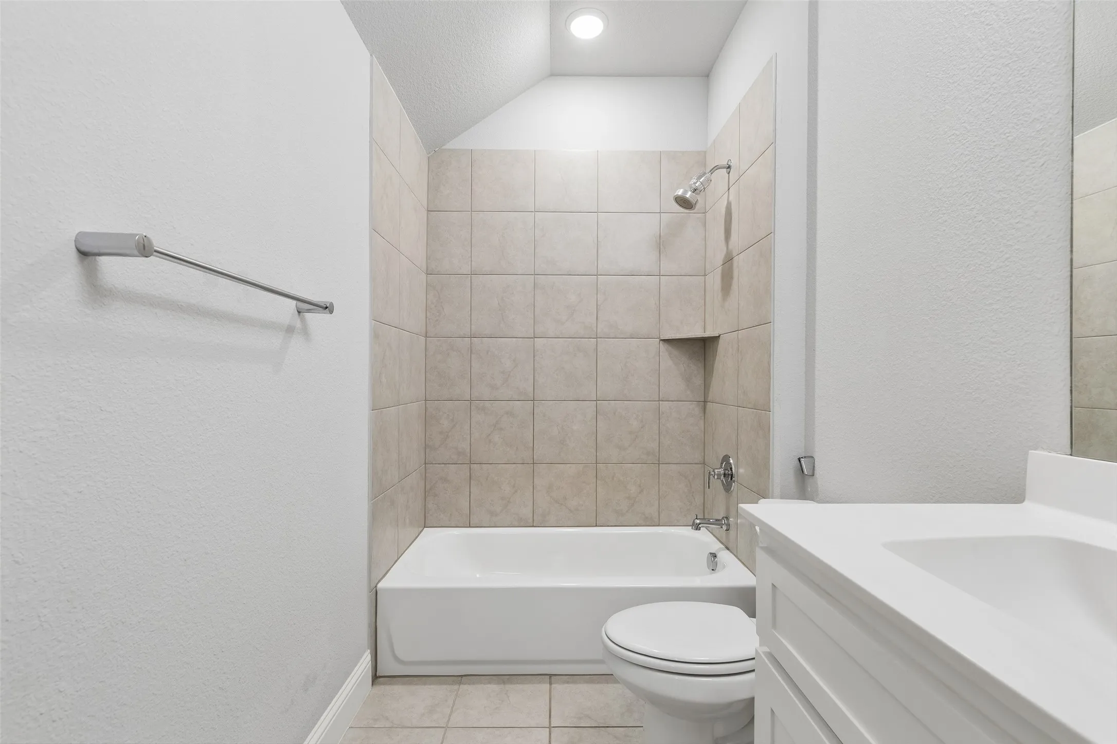 Full Bathroom #4 is on the short bedroom hallway and accessible to guests