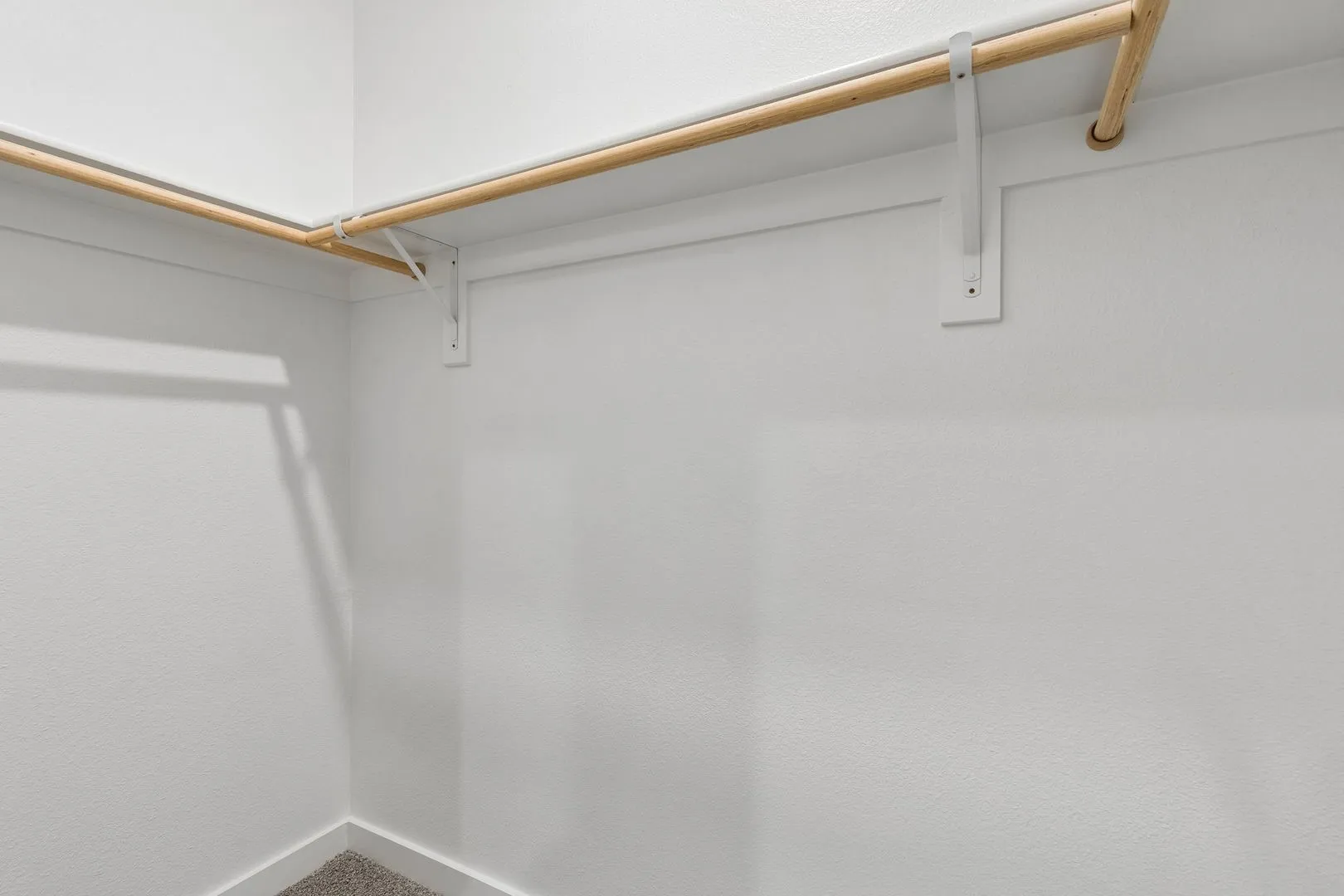 Primary Closet in the Cypress home plan by Trophy Signature Homes - REPRESENTATIVE PHOTO