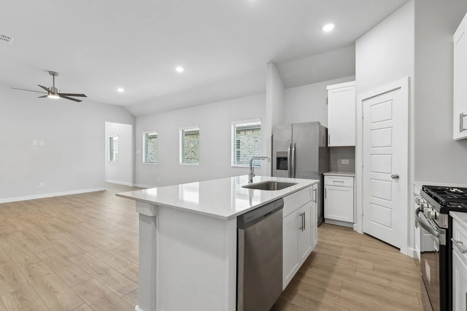 Kitchen in the Cypress home plan by Trophy Signature Homes - REPRESENTATIVE PHOTO